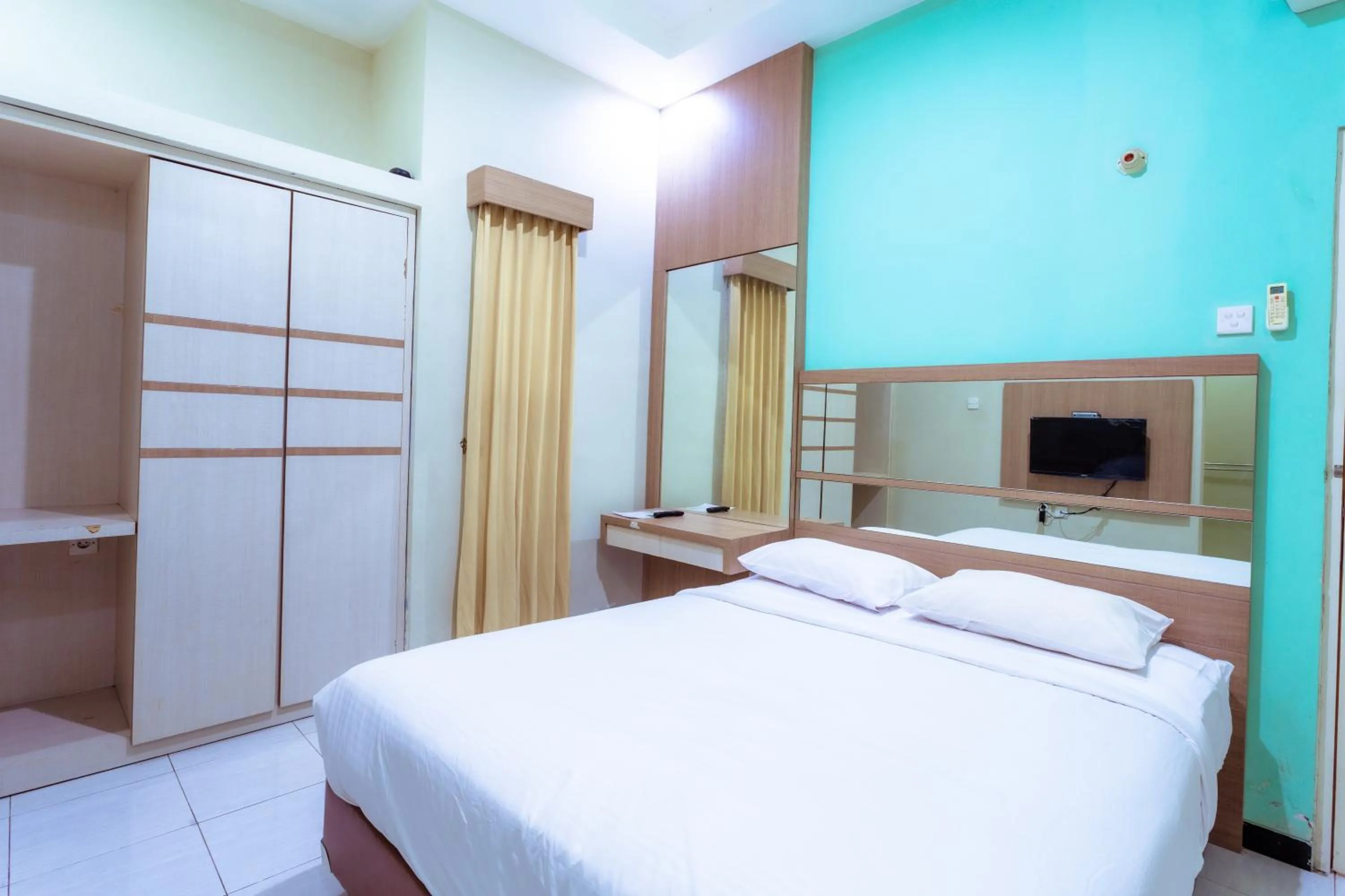 Bed in Ardhya Guesthouse Syariah by ecommerceloka