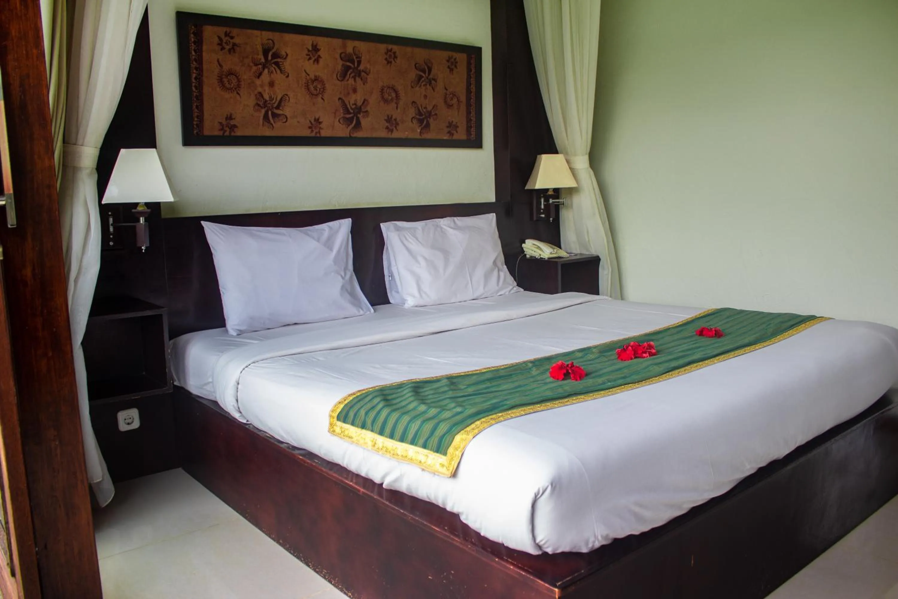 Bed in Anini Raka Resort & Spa