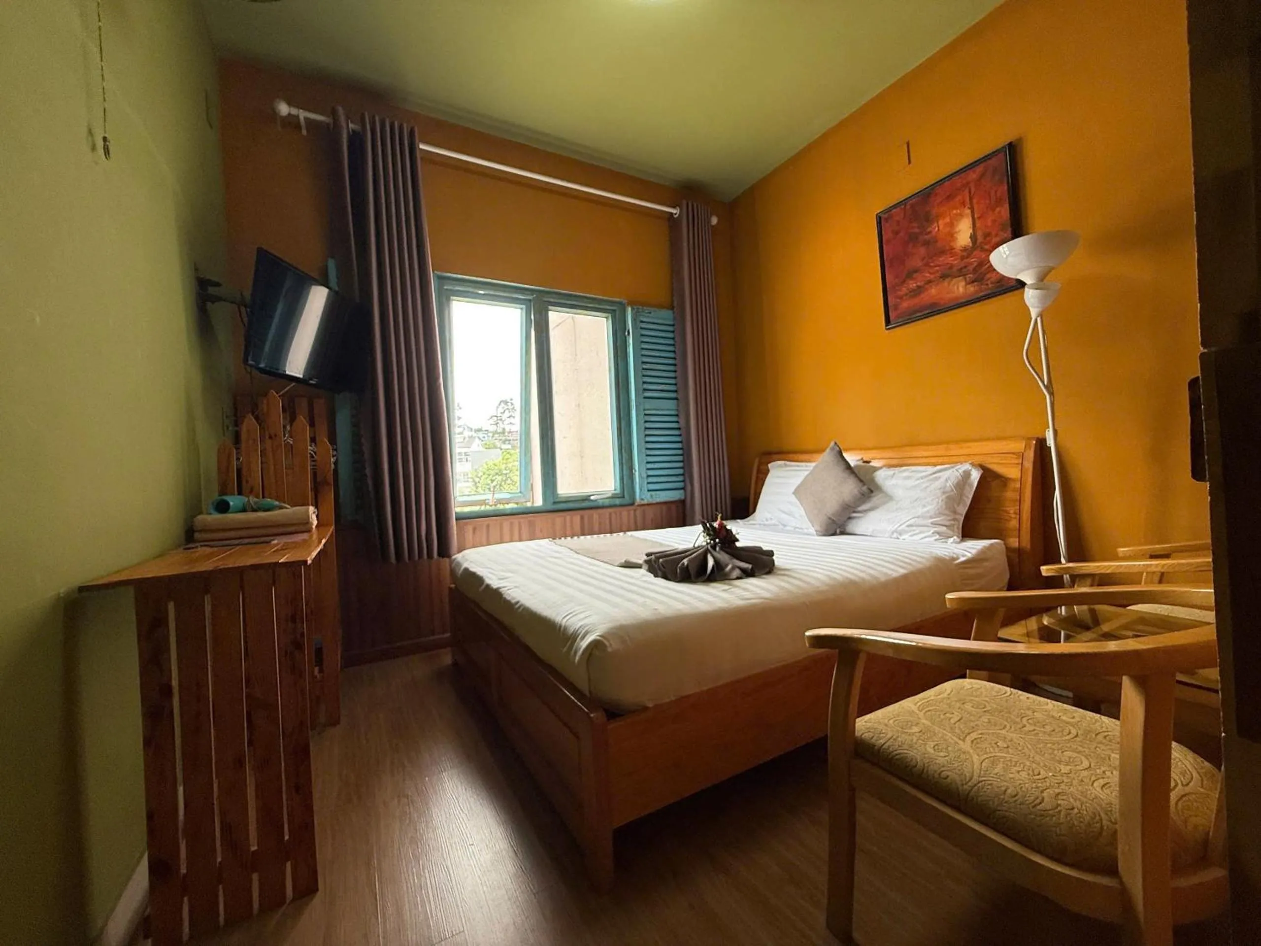 Bed in Redhouse Dalat Hotel