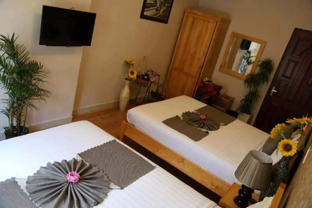 Bed in Redhouse Dalat Hotel