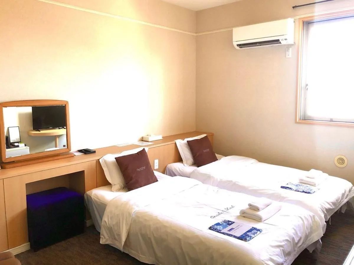 Bed in Ducale Garden Hotel Kujukuri