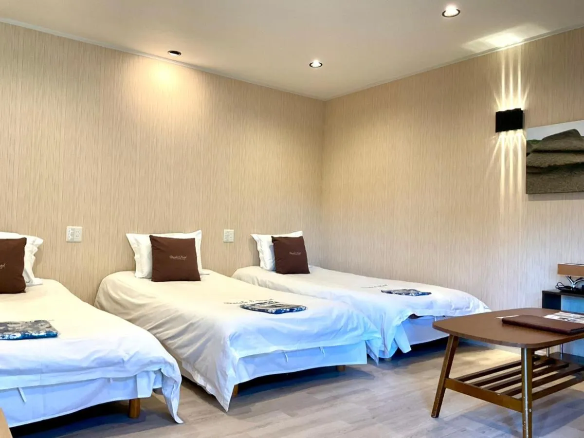 Bed in Ducale Garden Hotel Kujukuri