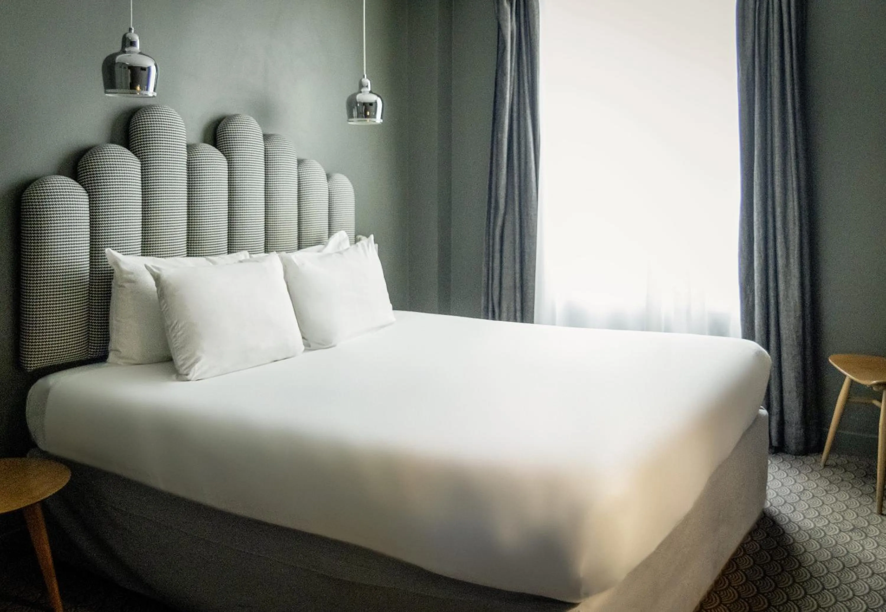Bed in Hotel Paradis