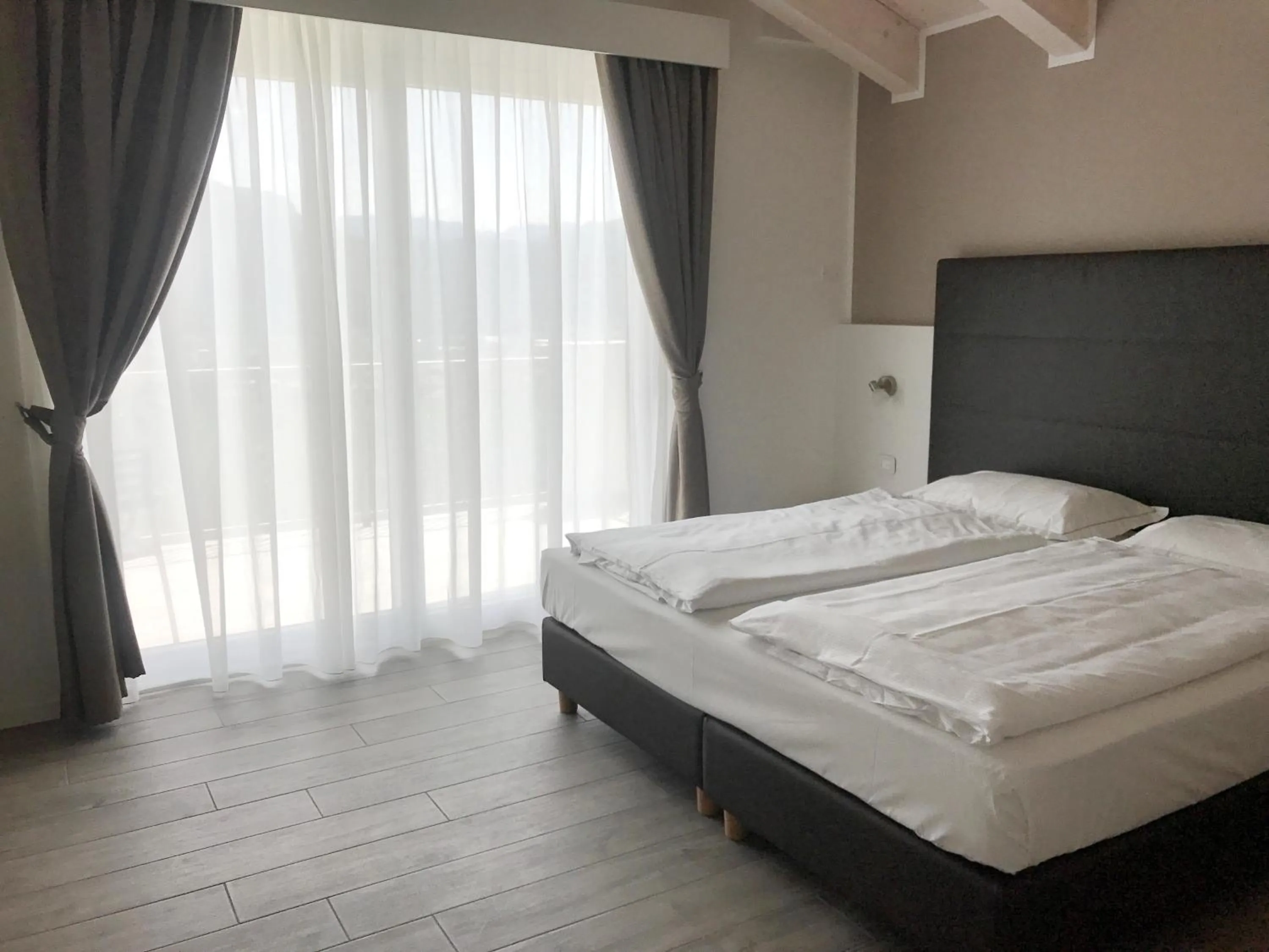Photo of the whole room, Bed in Maso Tobel Riva del Garda