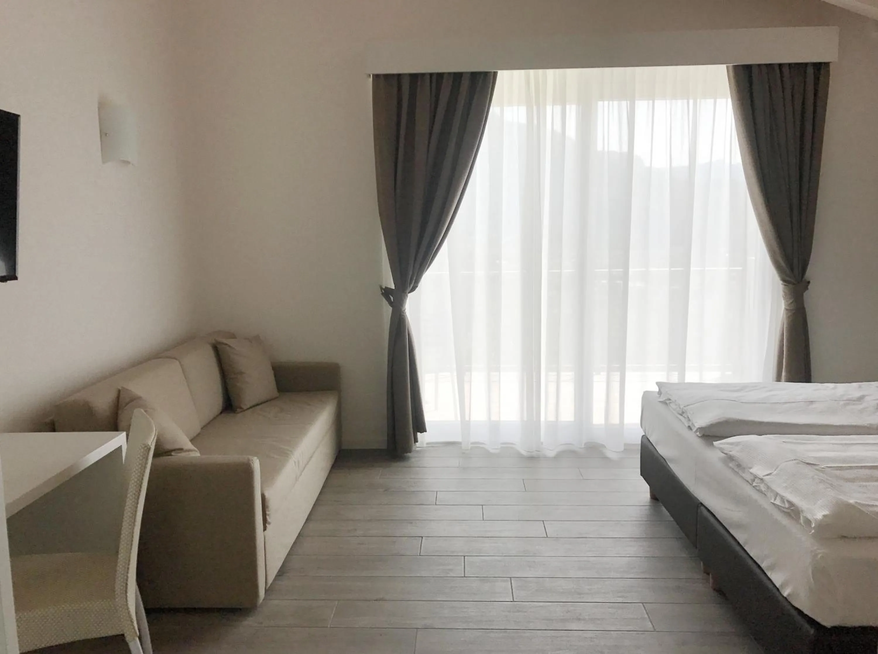 Living room, Bed in Maso Tobel Riva del Garda