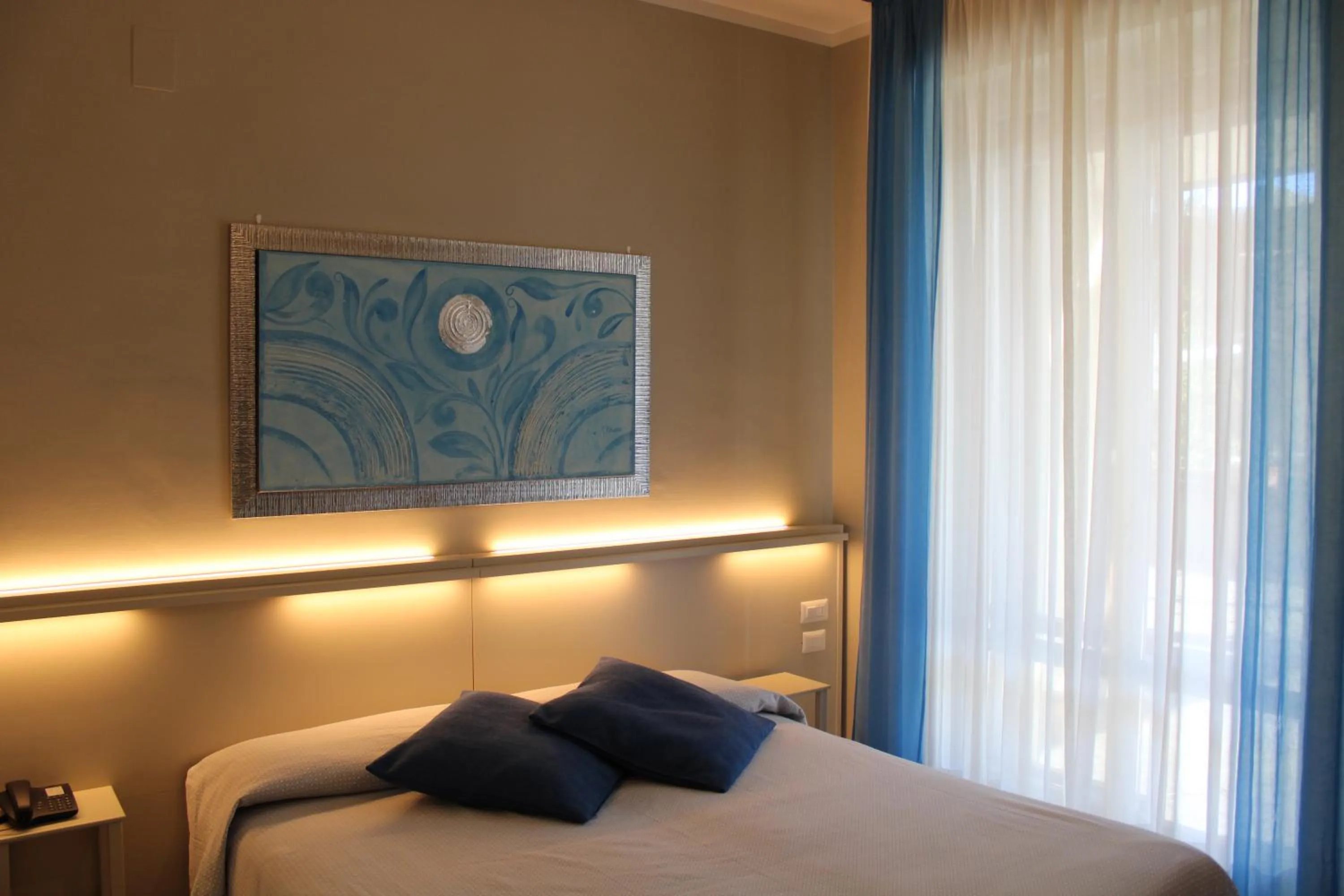 Bed in Hotel Delfina