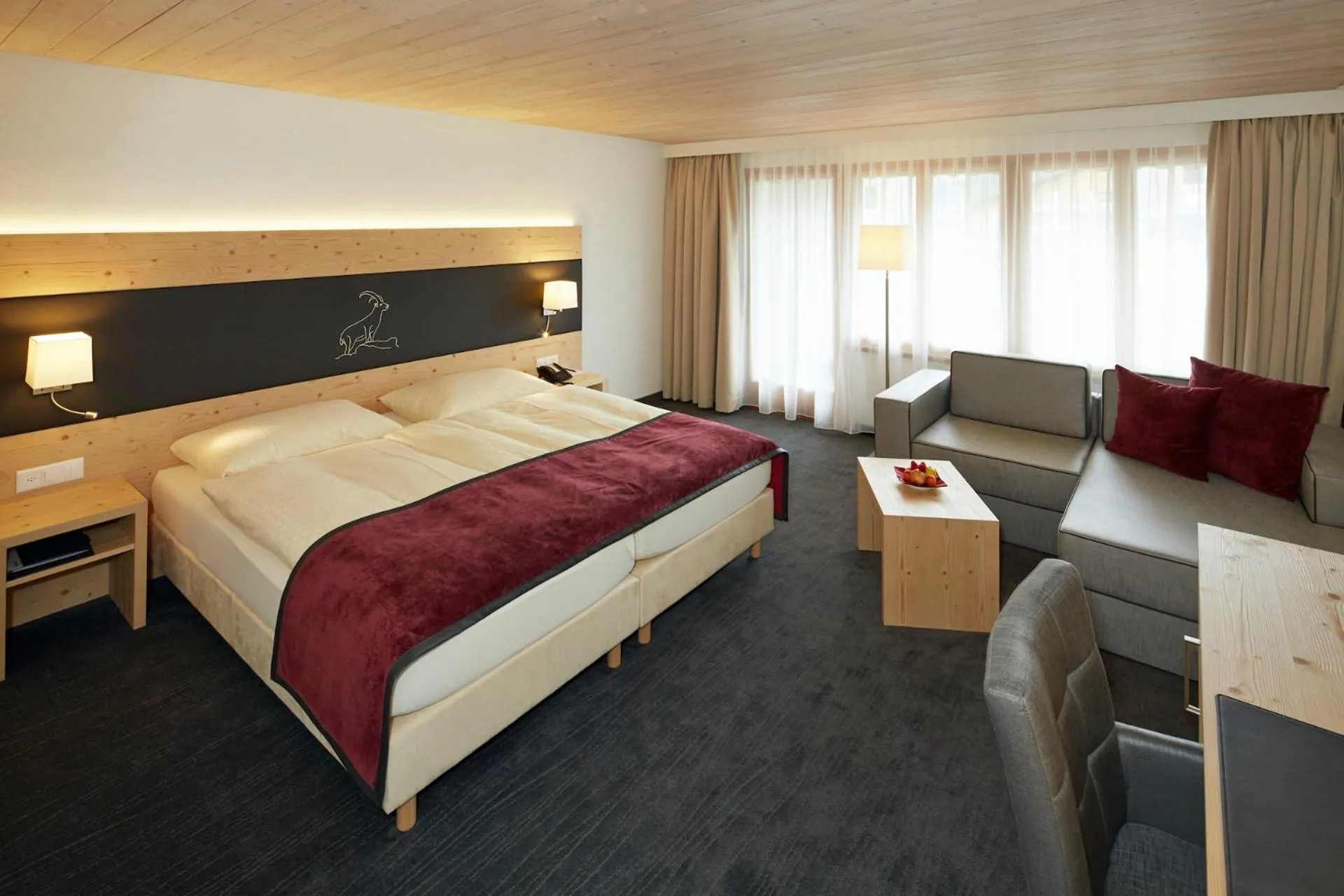 Photo of the whole room, Bed in Hotel Laaxerhof