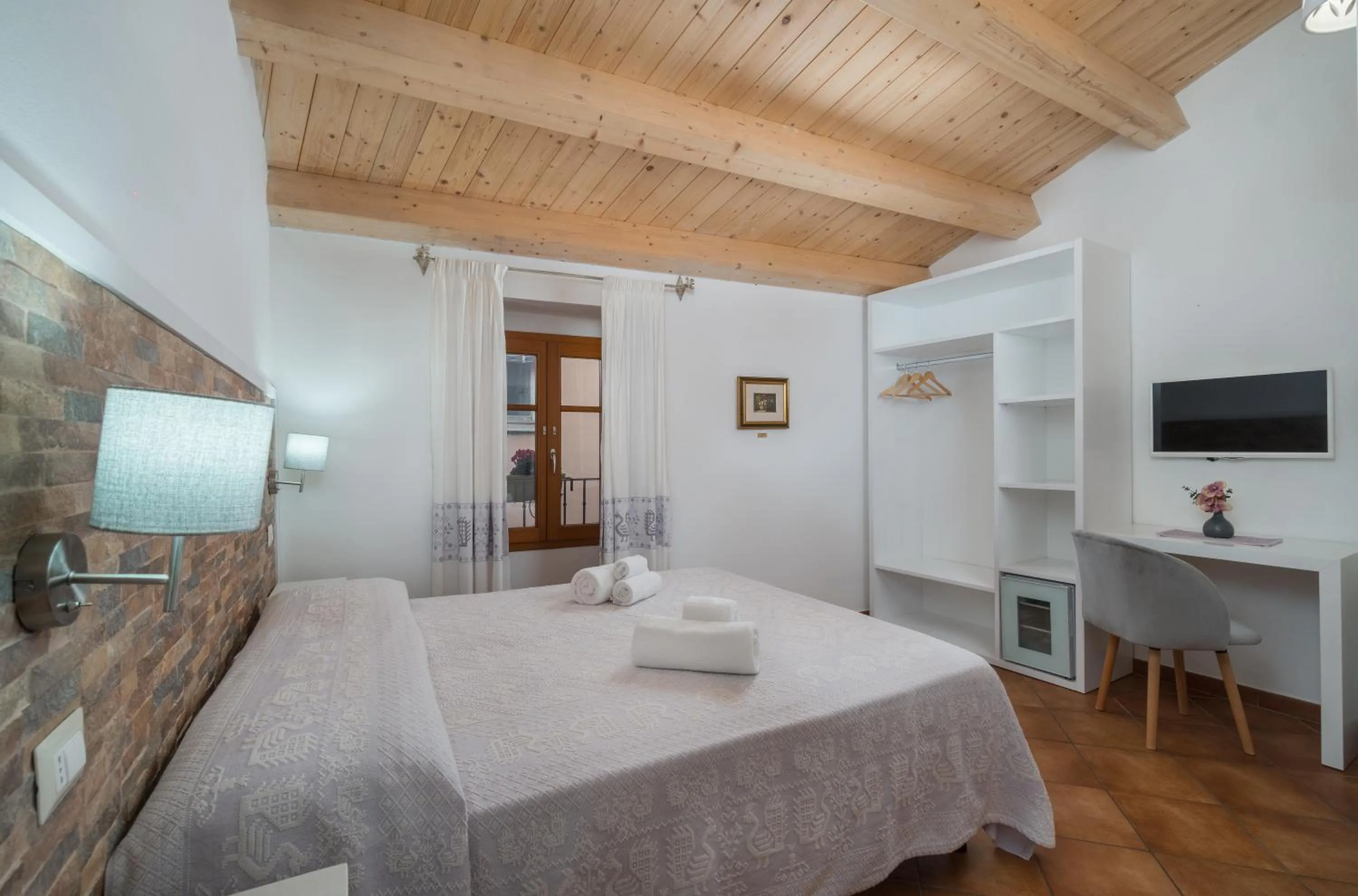 Bed in Bosa Queen House