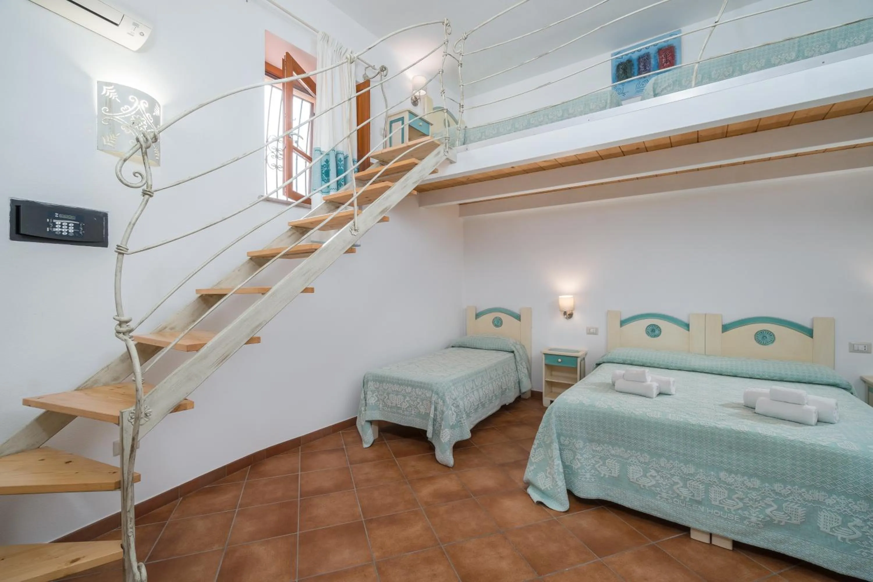 Bed in Bosa Queen House