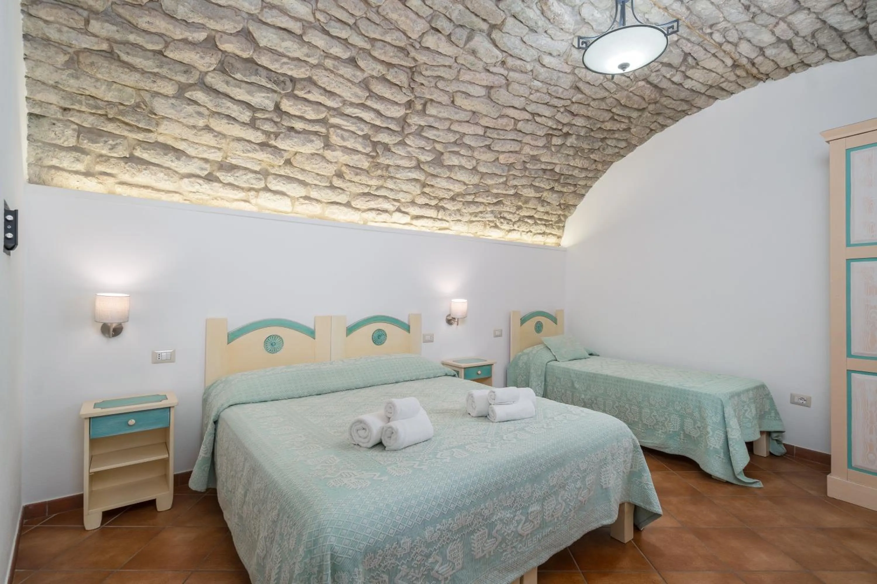 Bed in Bosa Queen House