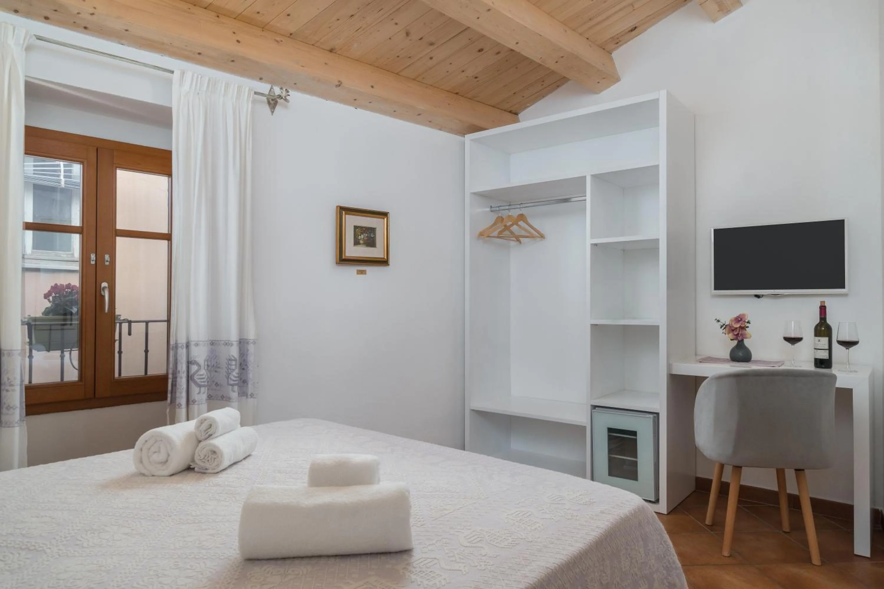 Bed in Bosa Queen House