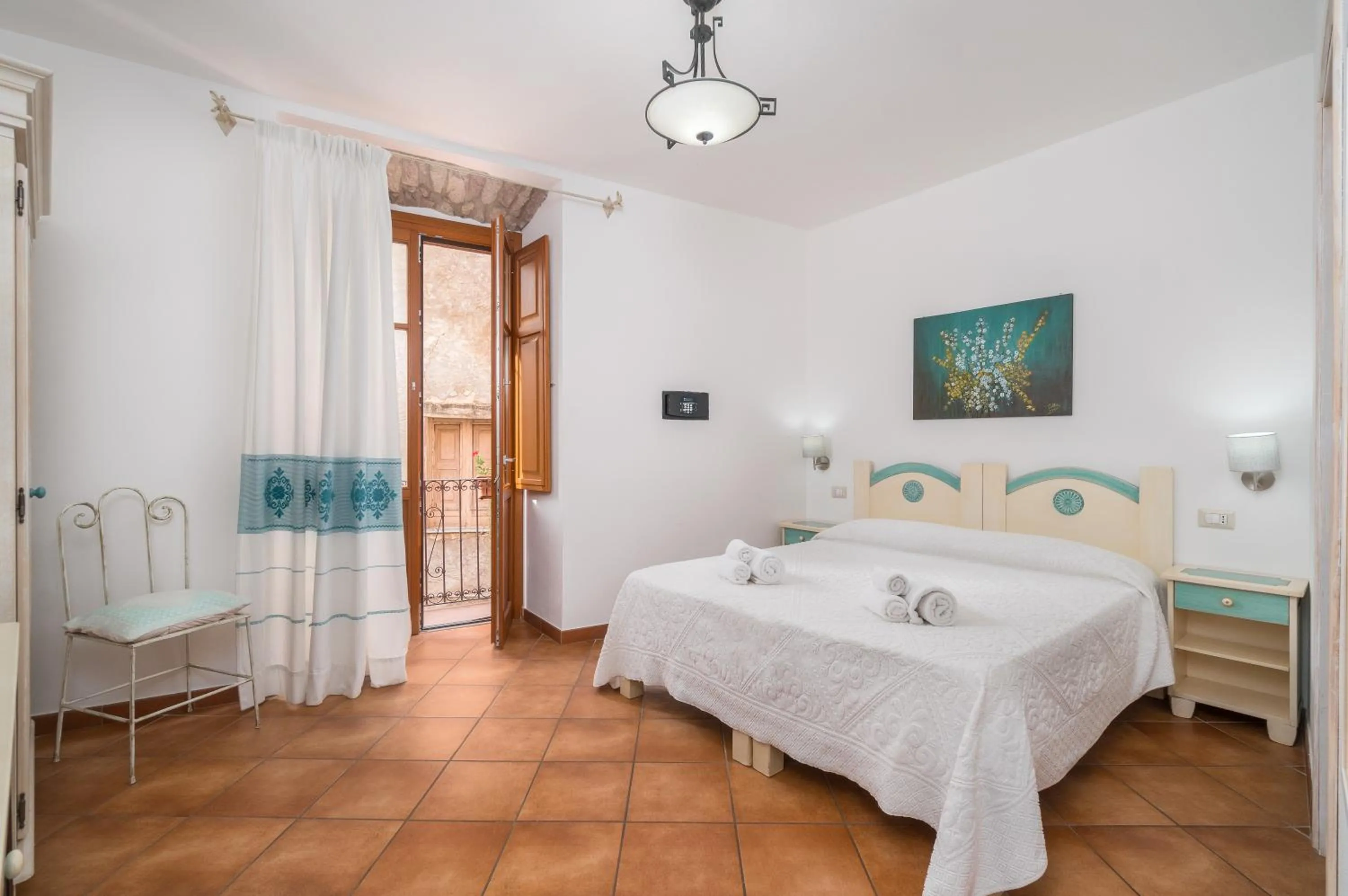 Bed in Bosa Queen House