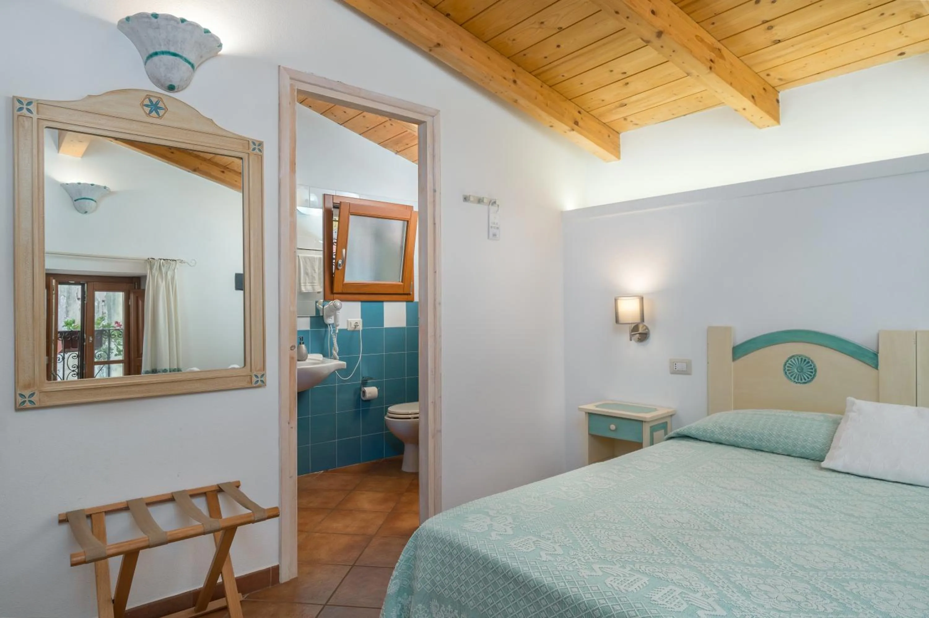 Bed in Bosa Queen House