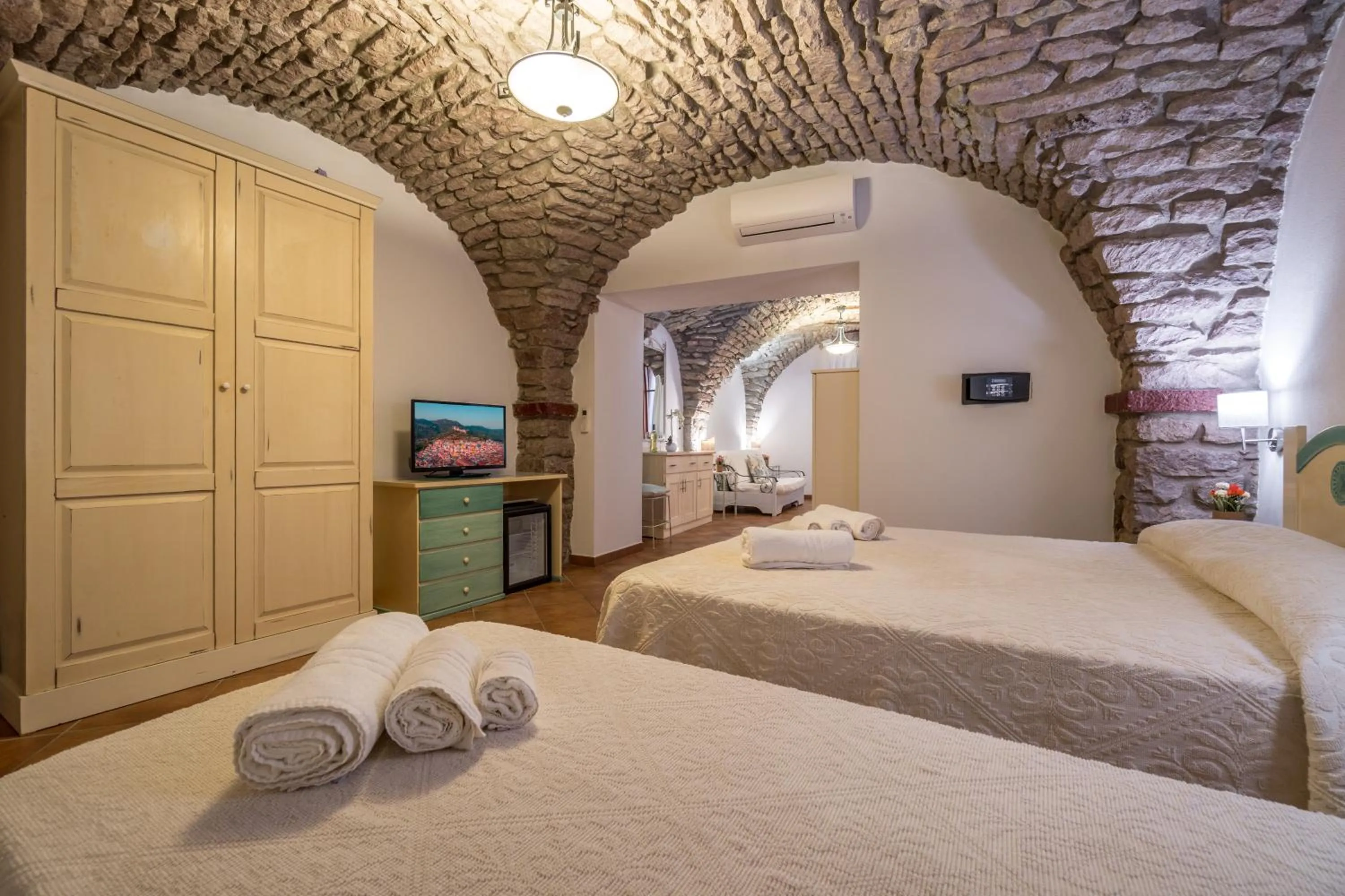 Bed in Bosa Queen House