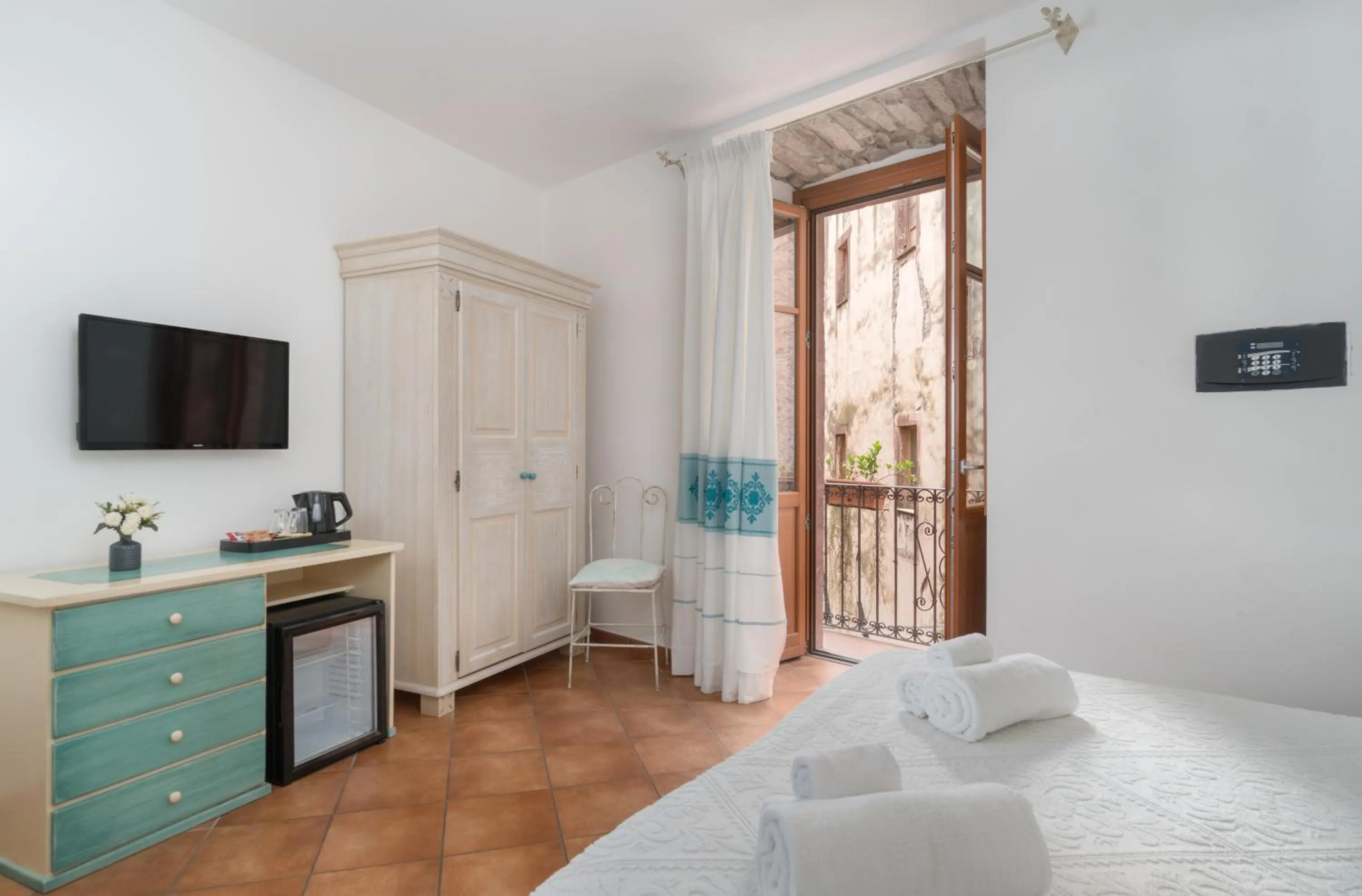 Bed in Bosa Queen House