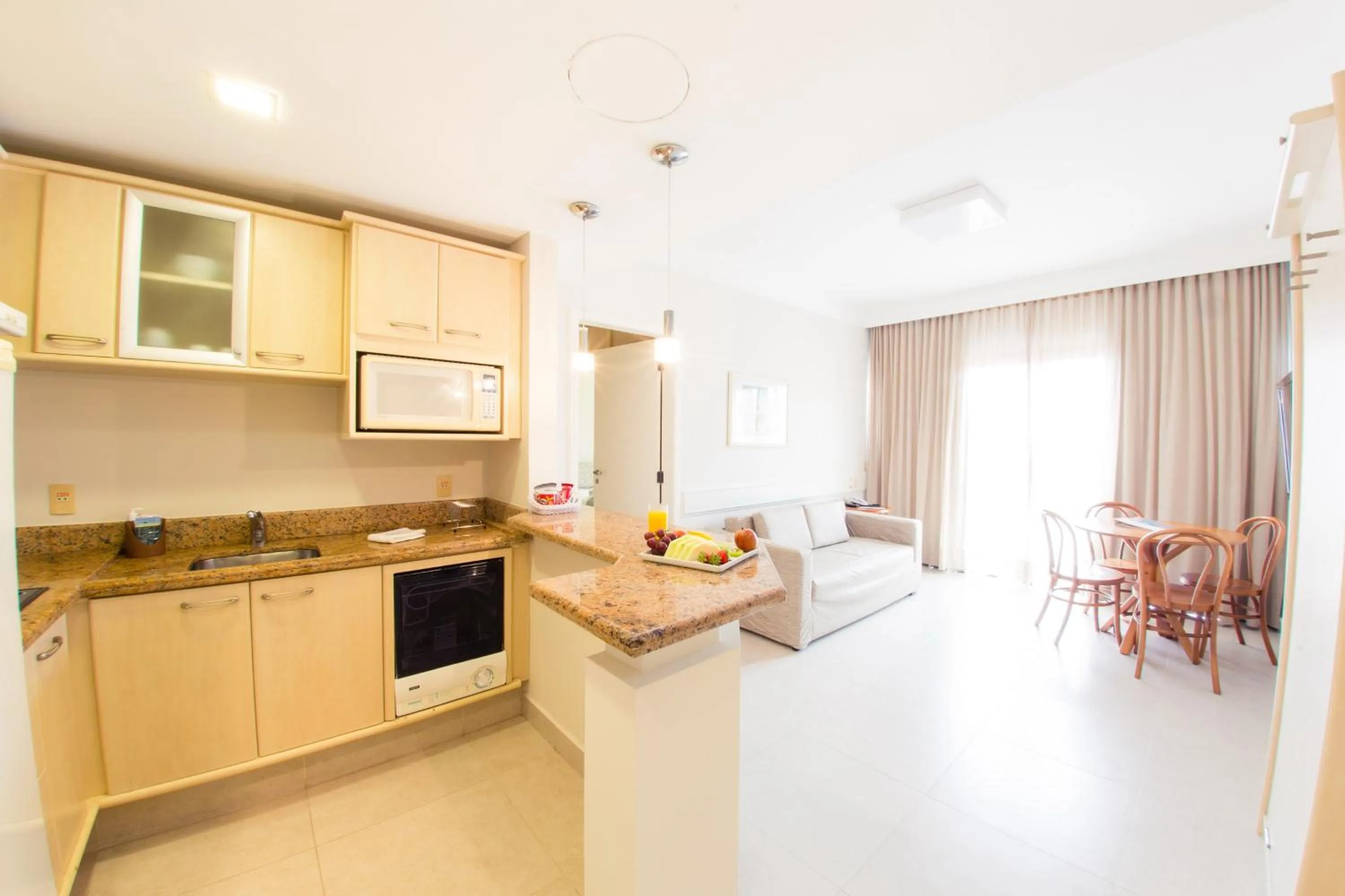 Kitchen or kitchenette in Hotel Jurerê Beach Village - OFICIAL