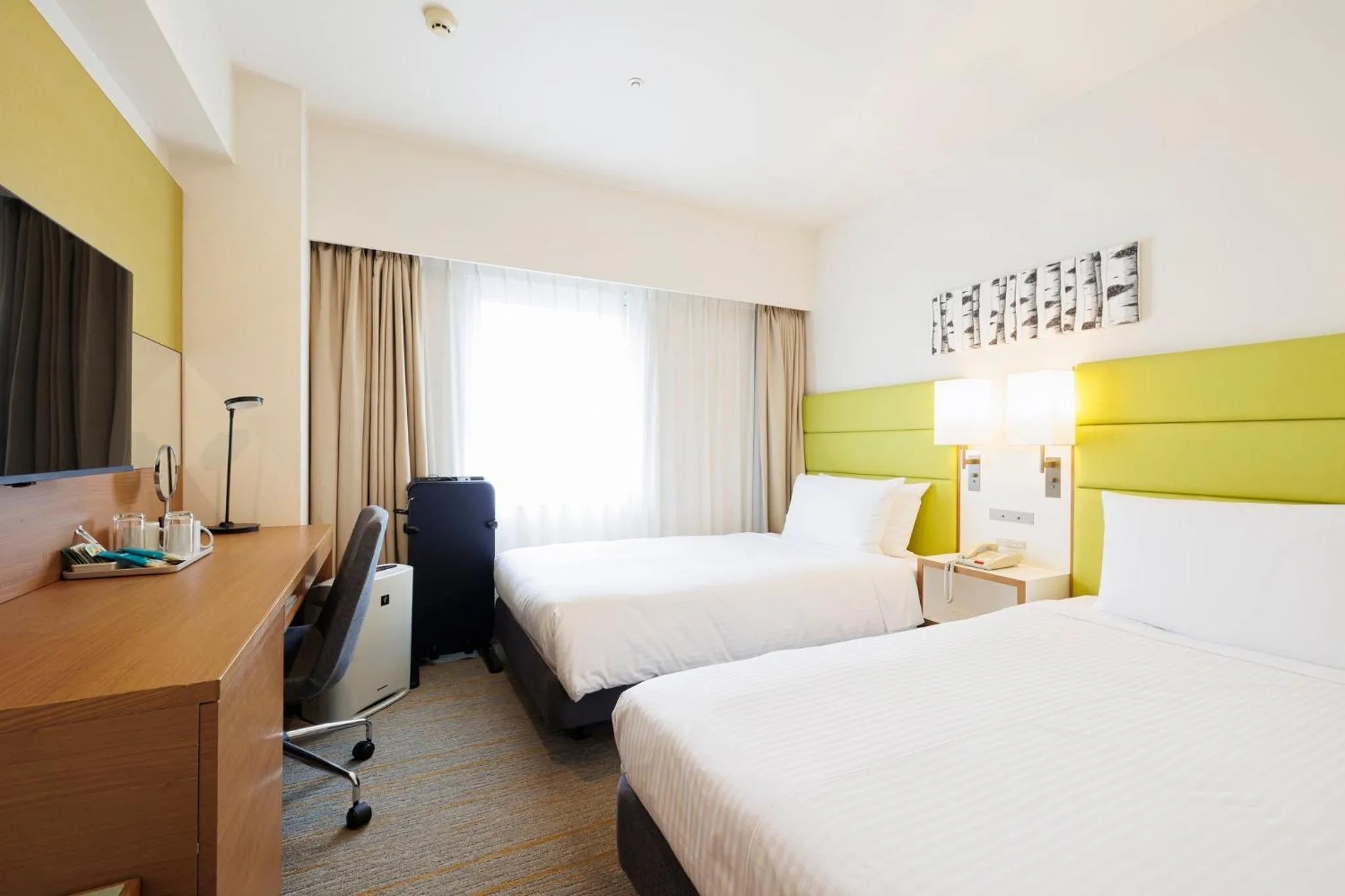 Photo of the whole room, Bed in ANA Holiday Inn Sapporo Susukino by IHG