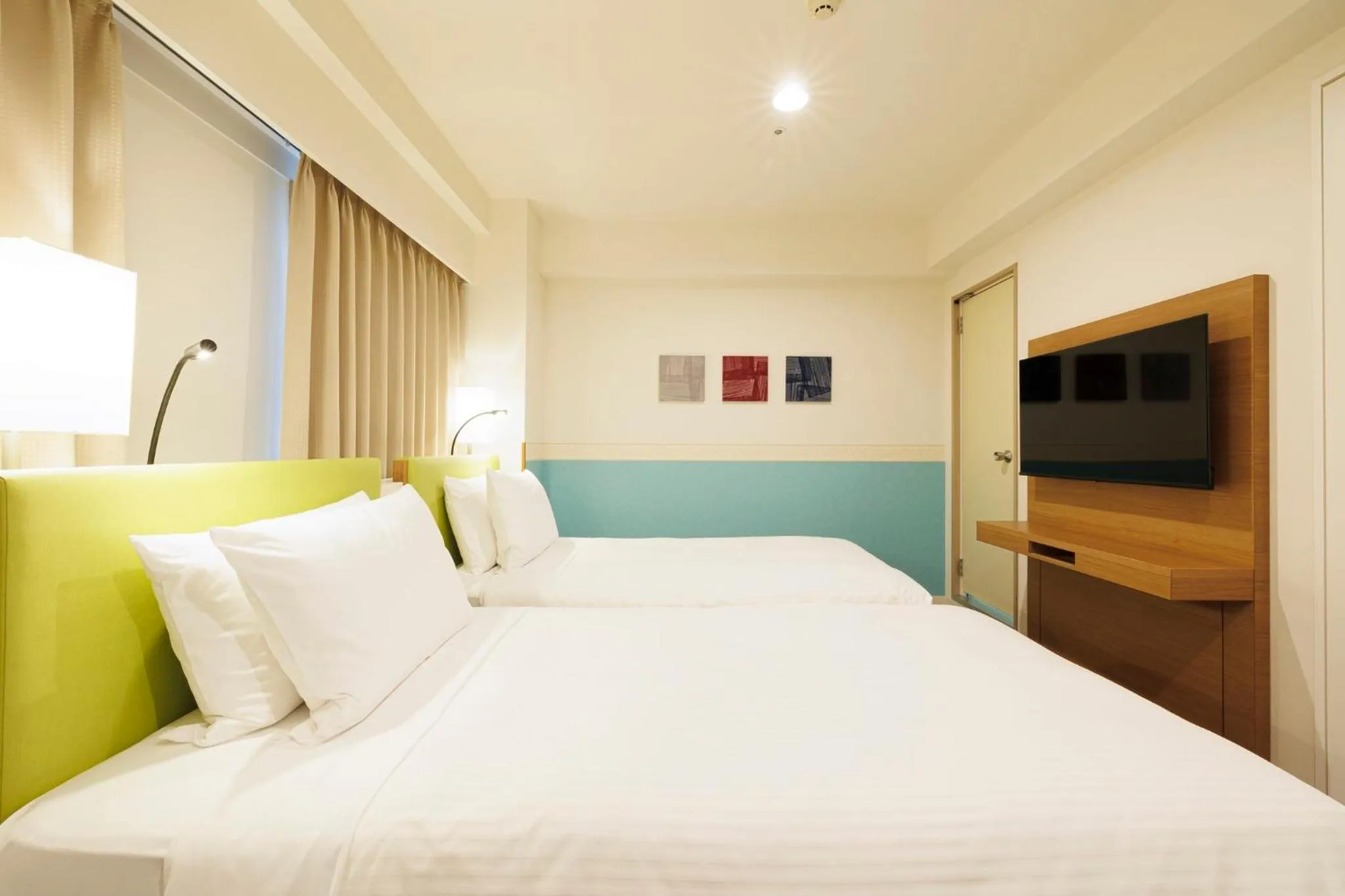 Photo of the whole room, Bed in ANA Holiday Inn Sapporo Susukino by IHG