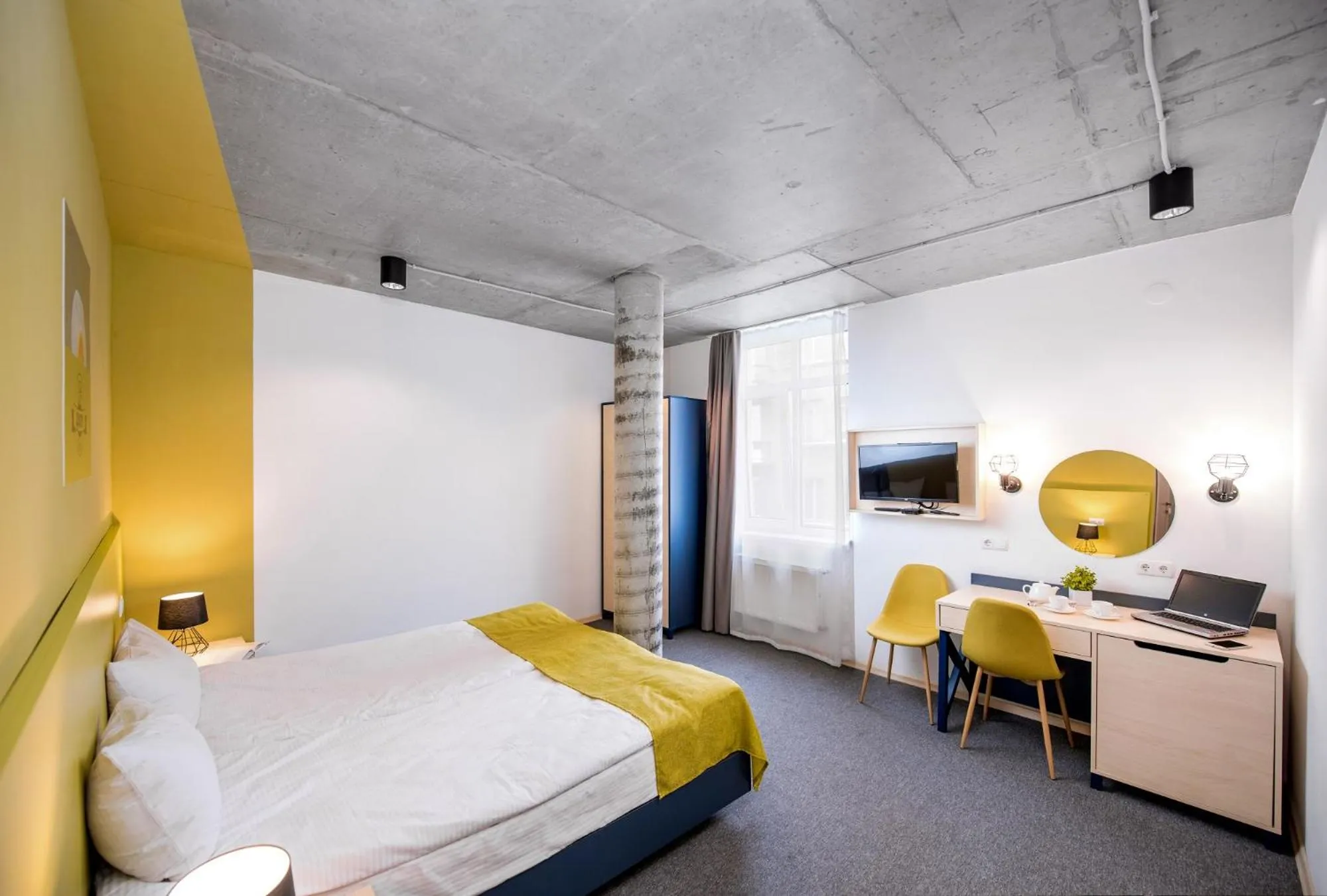 Photo of the whole room, Bed in Jam Hotel Hnatyuka