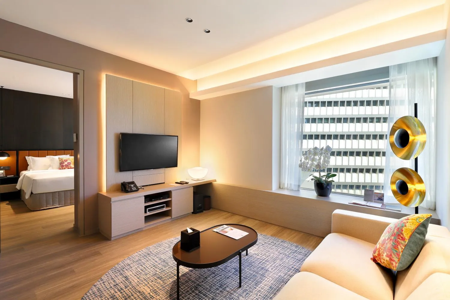 Living room, Bed in Pan Pacific Serviced Suites Orchard, Singapore