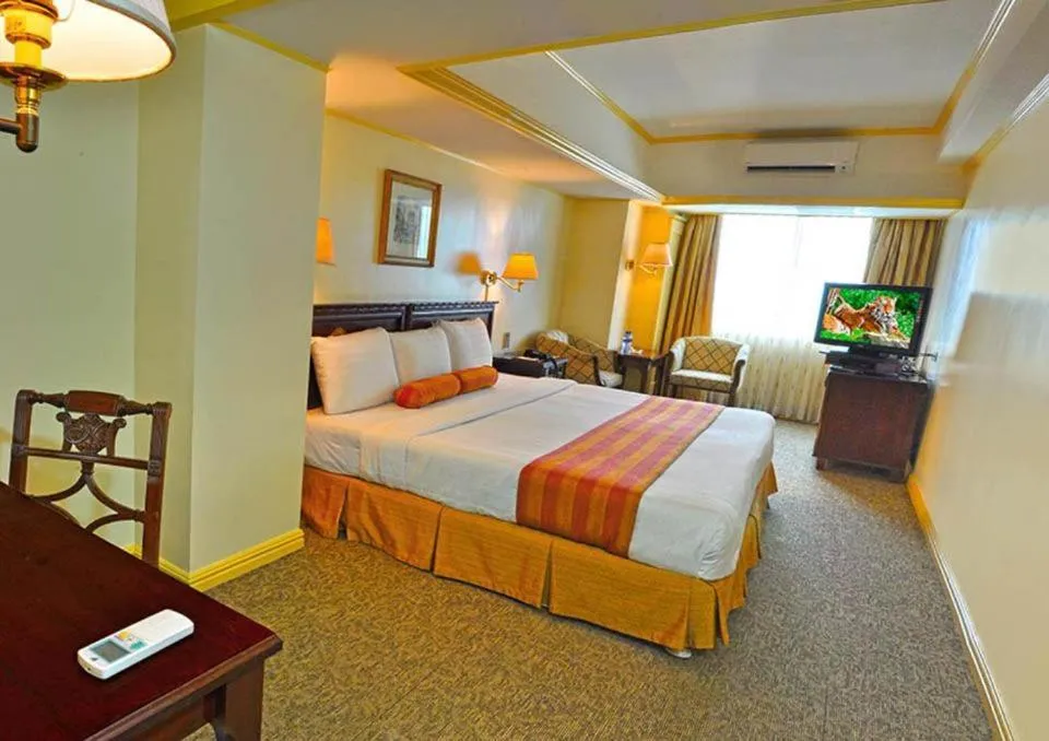 Bed in Networld Hotel Spa and Casino