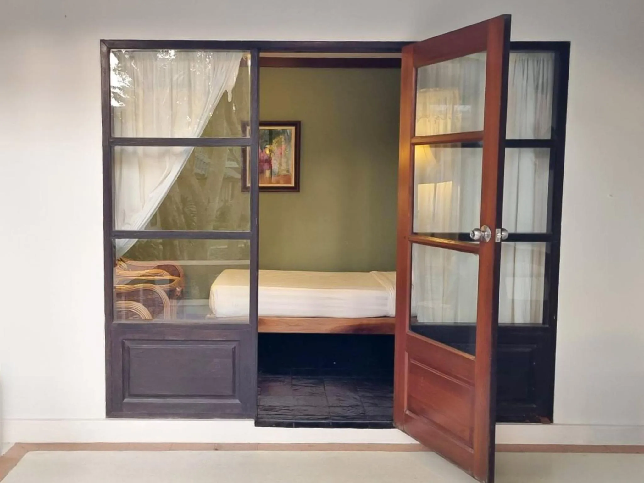 Bed in Comsaed River Kwai Resort