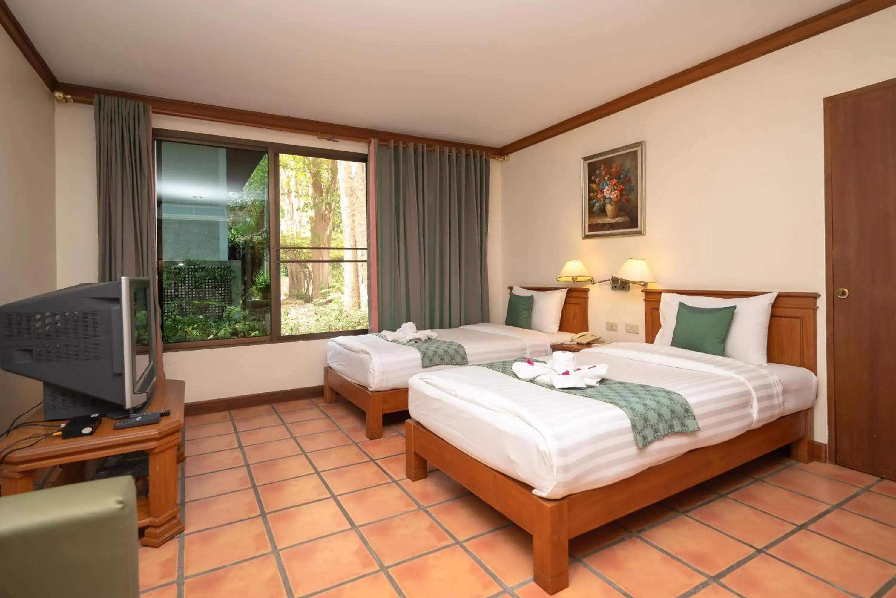 Garden Deluxe Quad in Comsaed River Kwai Resort Garden Deluxe Quad in Comsaed River Kwai Resort