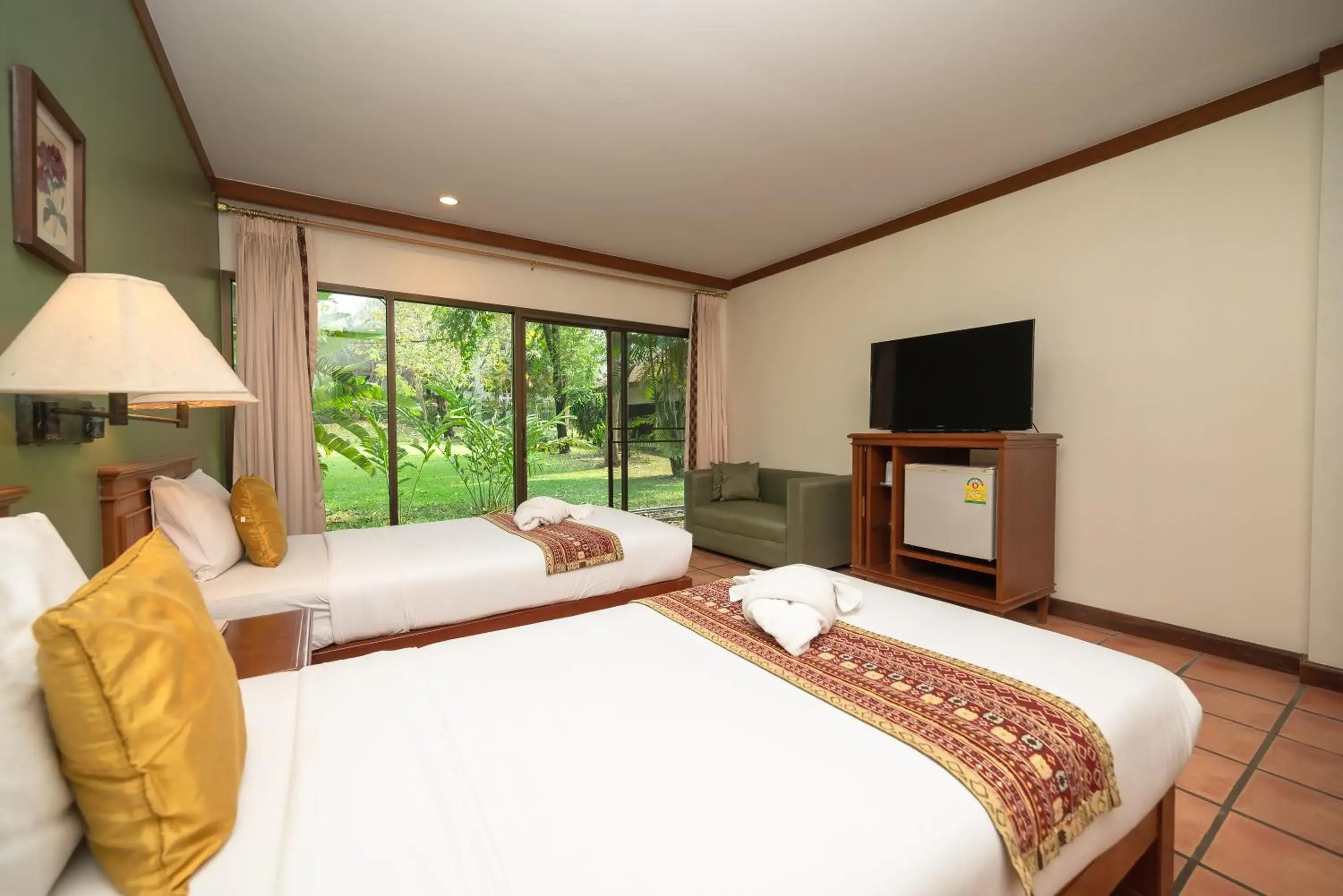 Photo of the whole room, Bed in Comsaed River Kwai Resort Photo of the whole room, Bed in Comsaed River Kwai Resort
