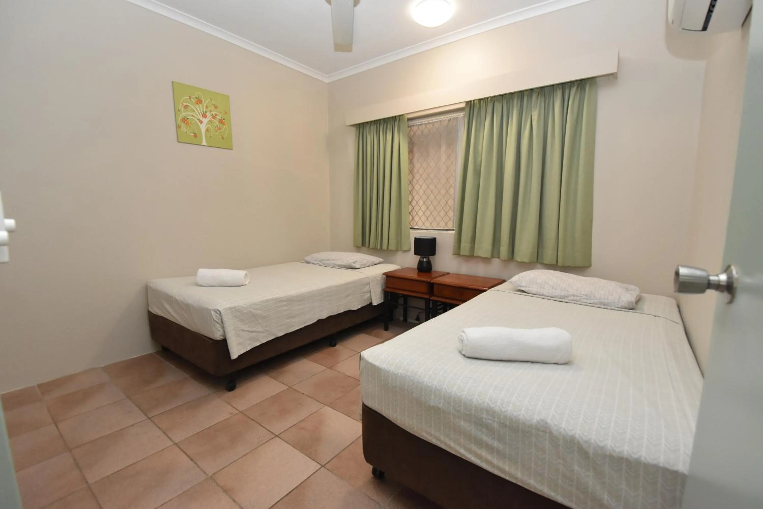 Bed in Tradewinds McLeod Holiday Apartments