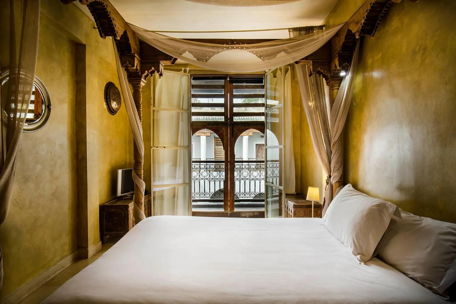 Bed in Riad Le Rihani