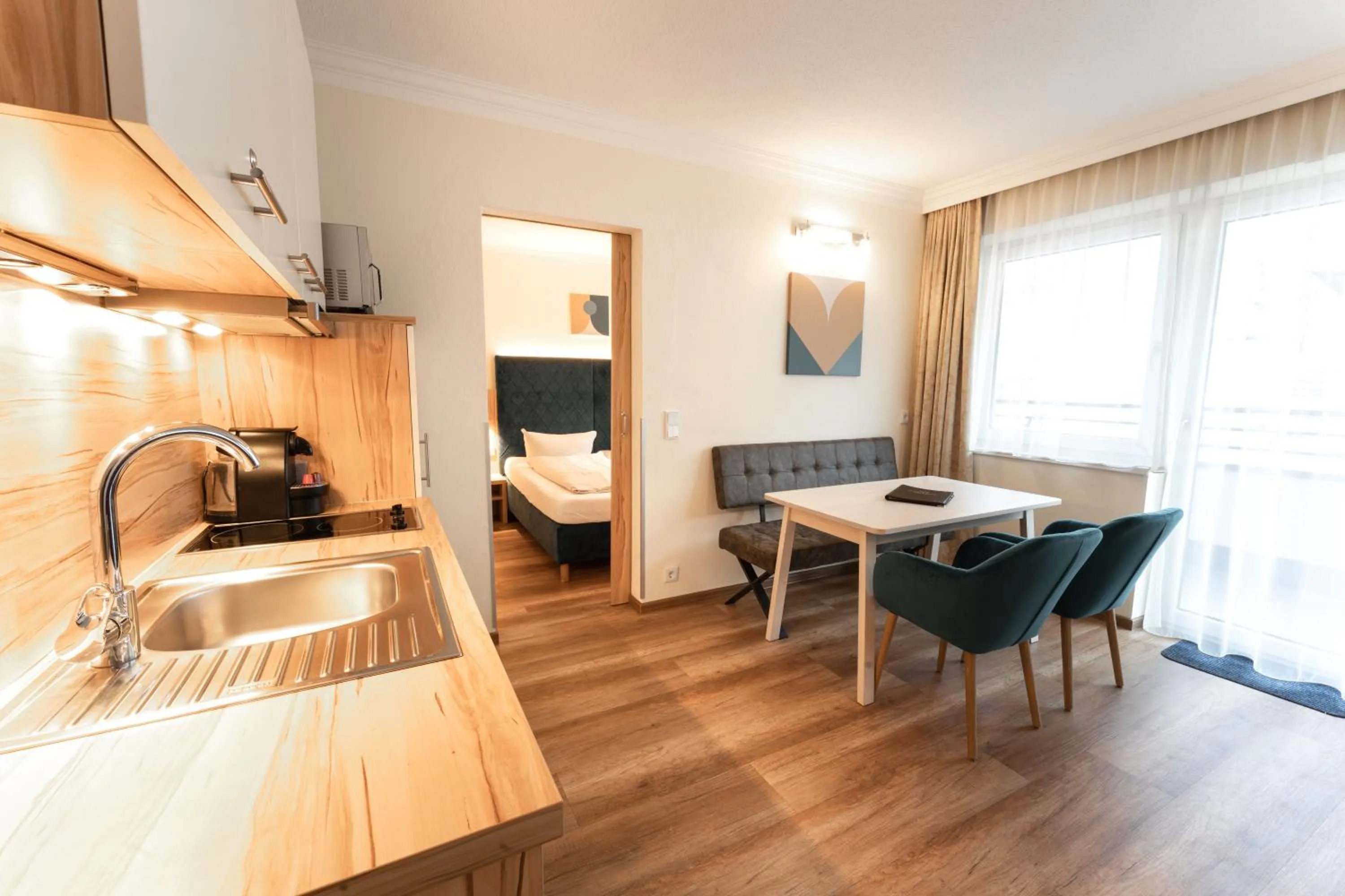 Bed in Aparthotel Dorfplatzl Garni Apartments & B&B