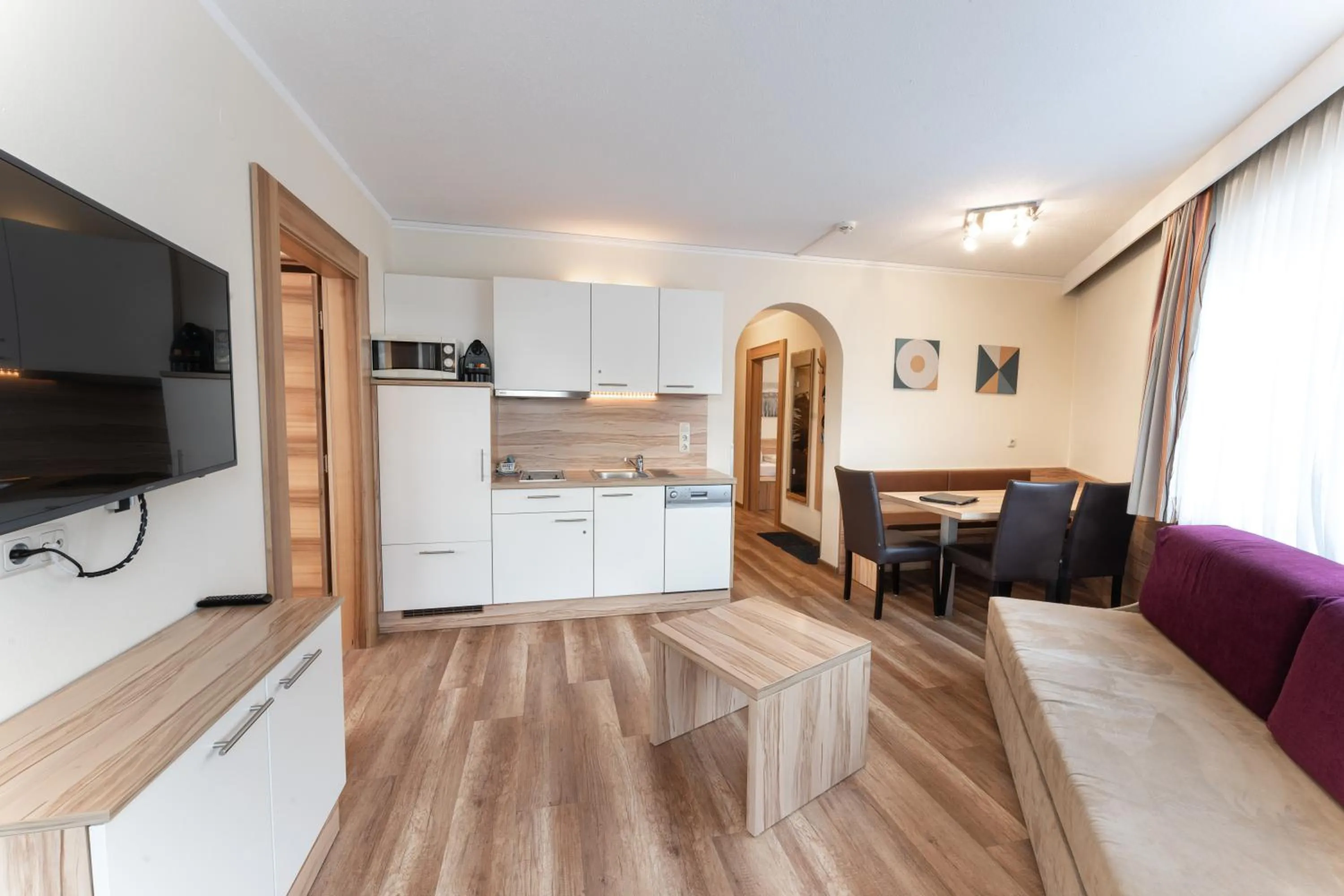 Communal lounge/ TV room in Aparthotel Dorfplatzl Garni Apartments & B&B