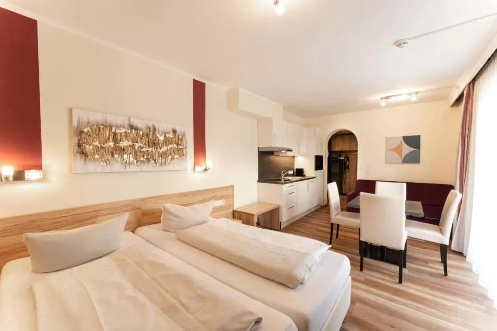 Living room, Bed in Aparthotel Dorfplatzl Garni Apartments & B&B