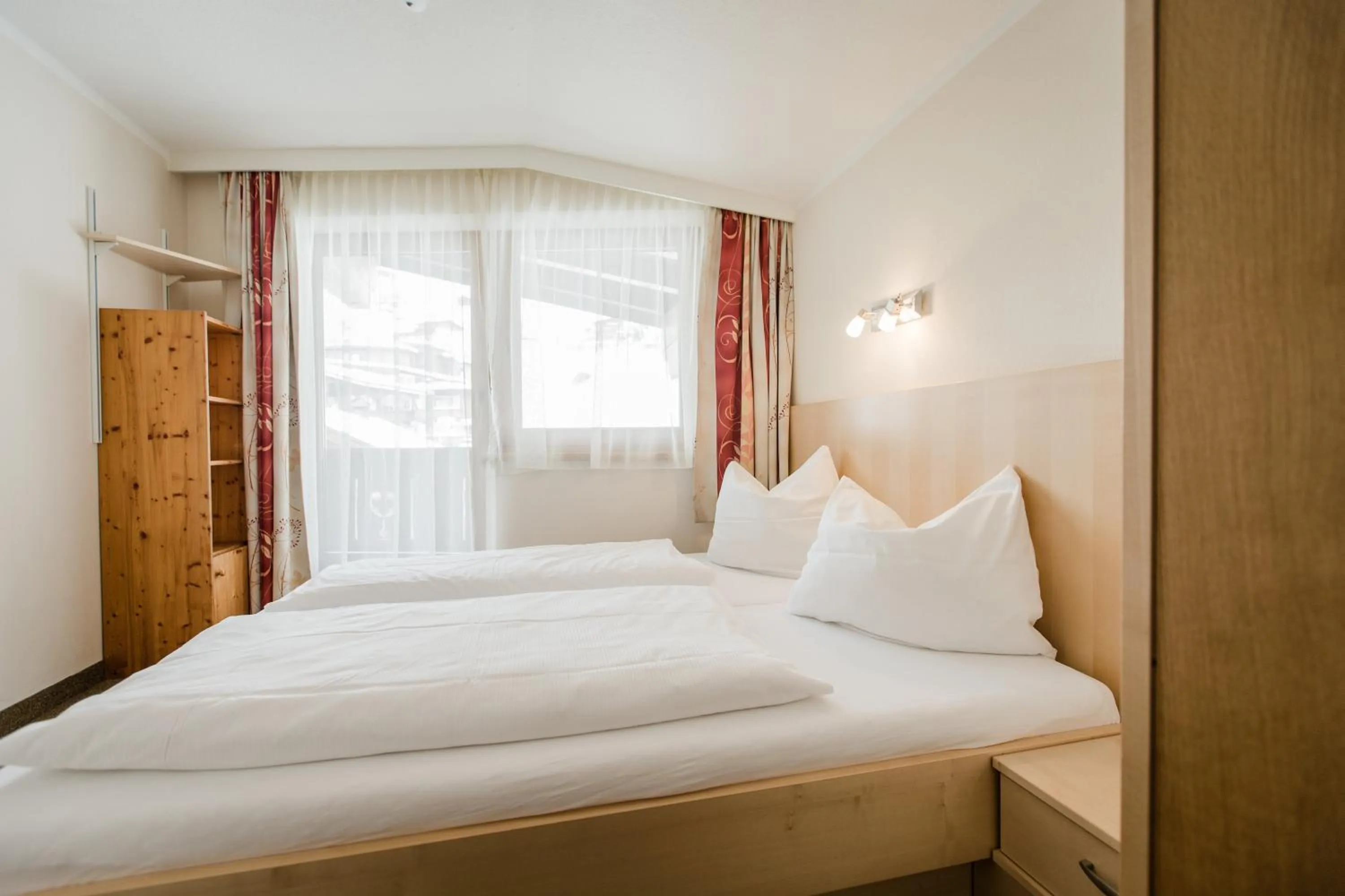 Bedroom, Bed in Aparthotel Dorfplatzl Garni Apartments & B&B