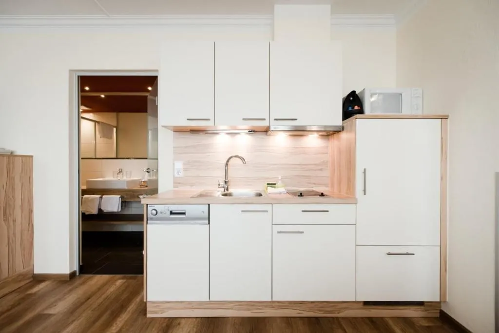 dishwasher in Aparthotel Dorfplatzl Garni Apartments & B&B