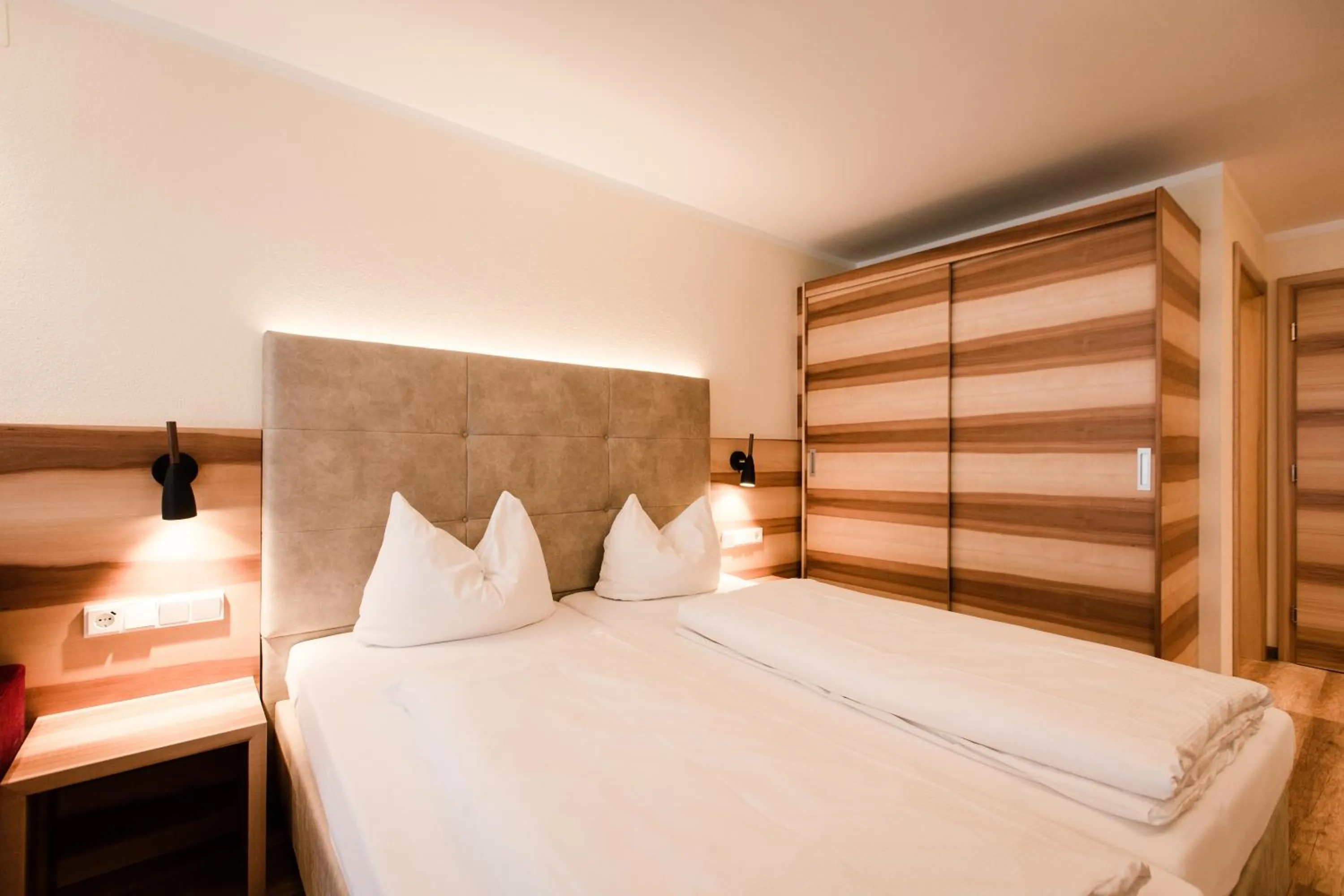 Bed in Aparthotel Dorfplatzl Garni Apartments & B&B