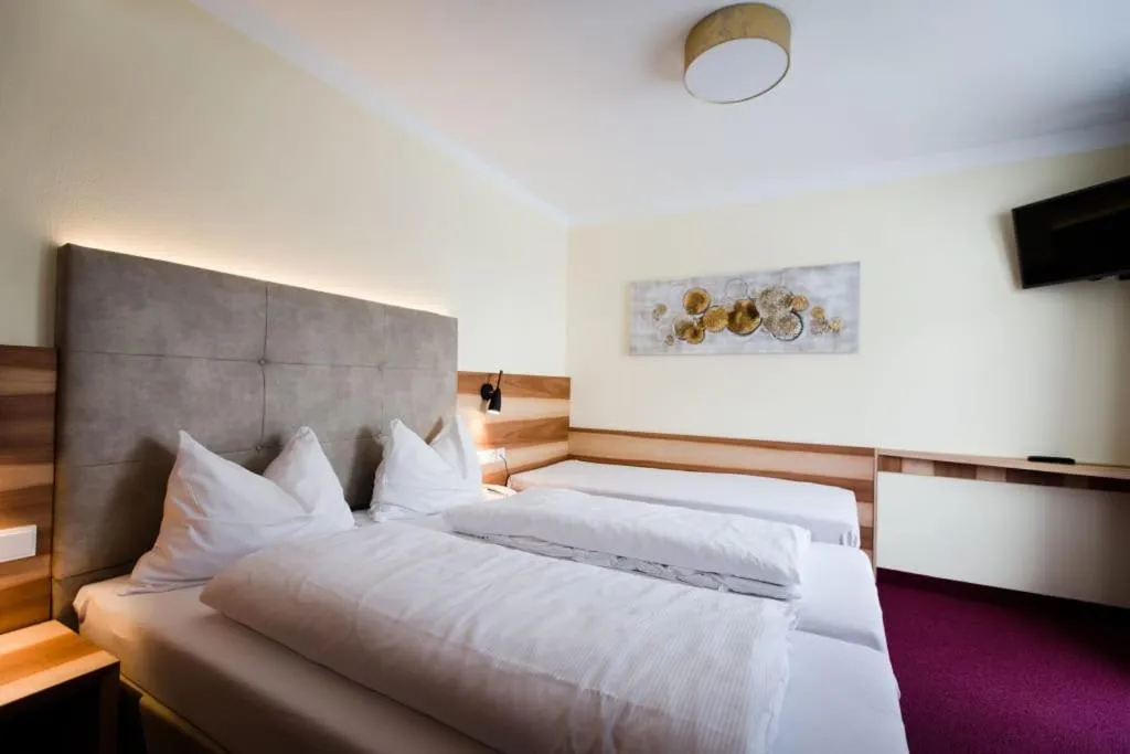 Bed in Aparthotel Dorfplatzl Garni Apartments & B&B
