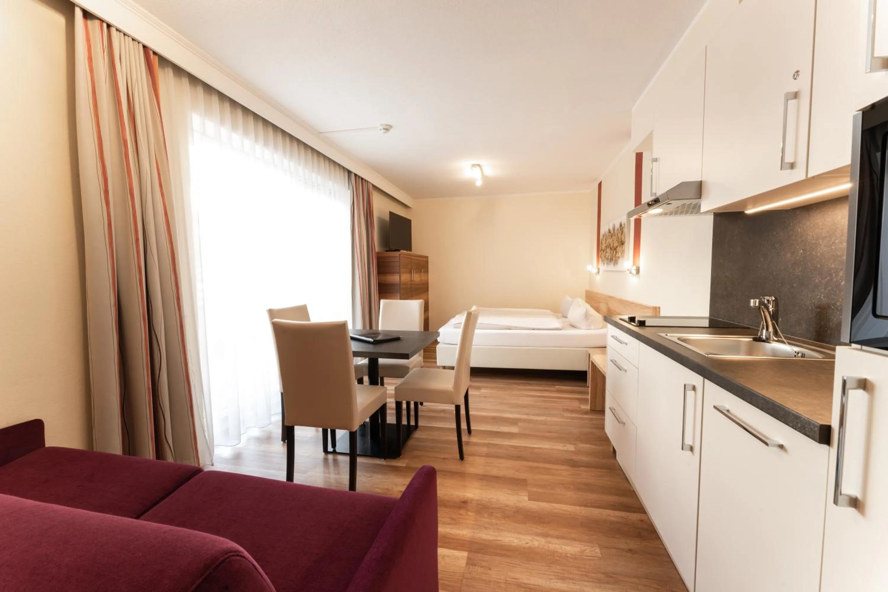 Bed in Aparthotel Dorfplatzl Garni Apartments & B&B