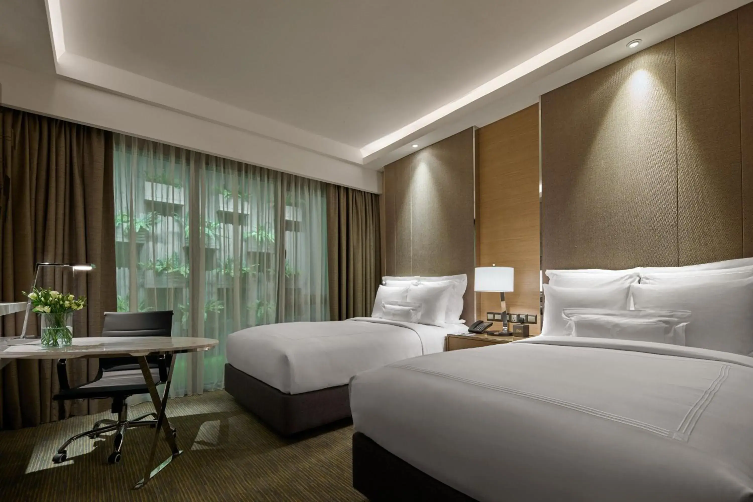 Photo of the whole room, Bed in JW Marriott Kuala Lumpur