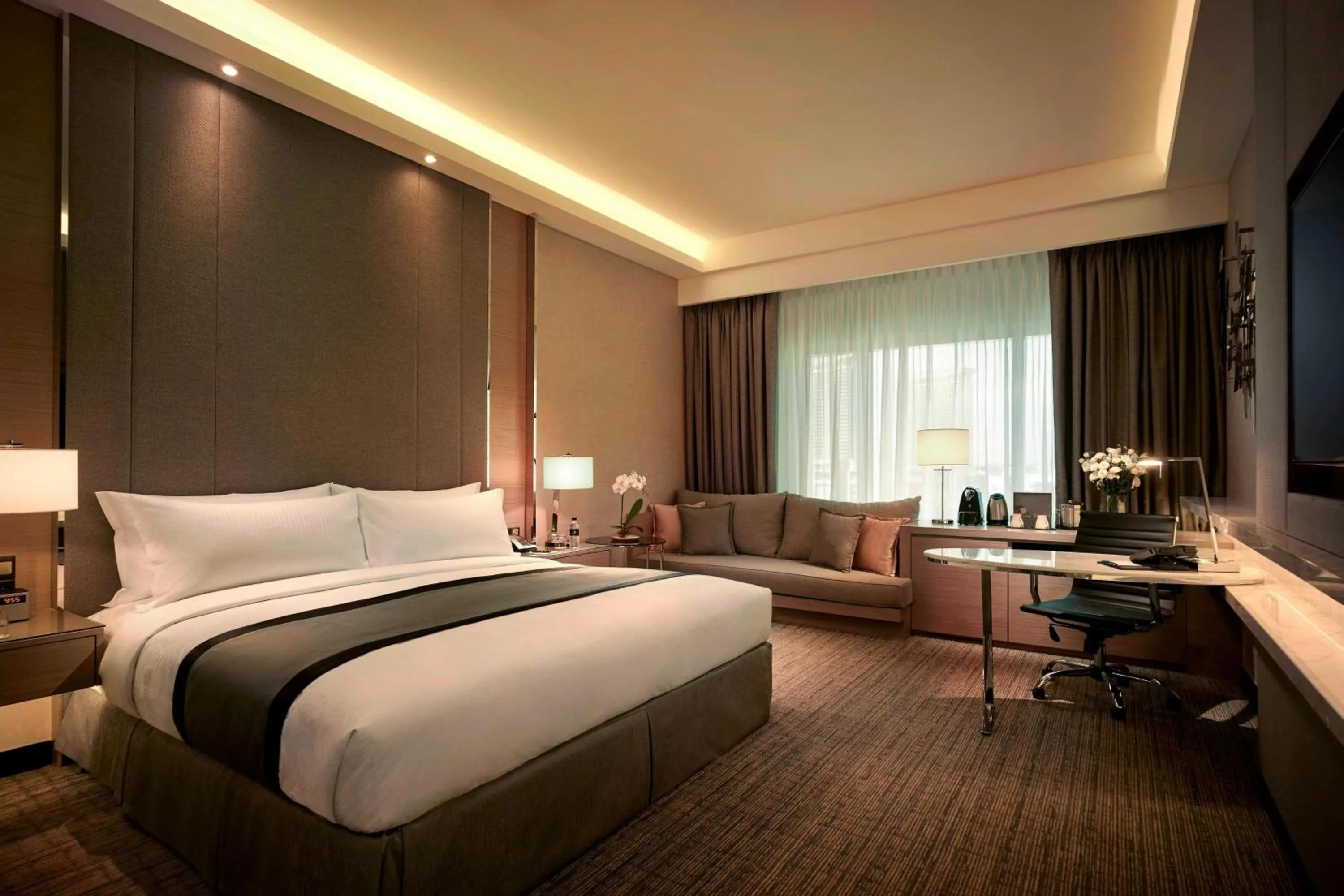 Photo of the whole room, Bed in JW Marriott Kuala Lumpur