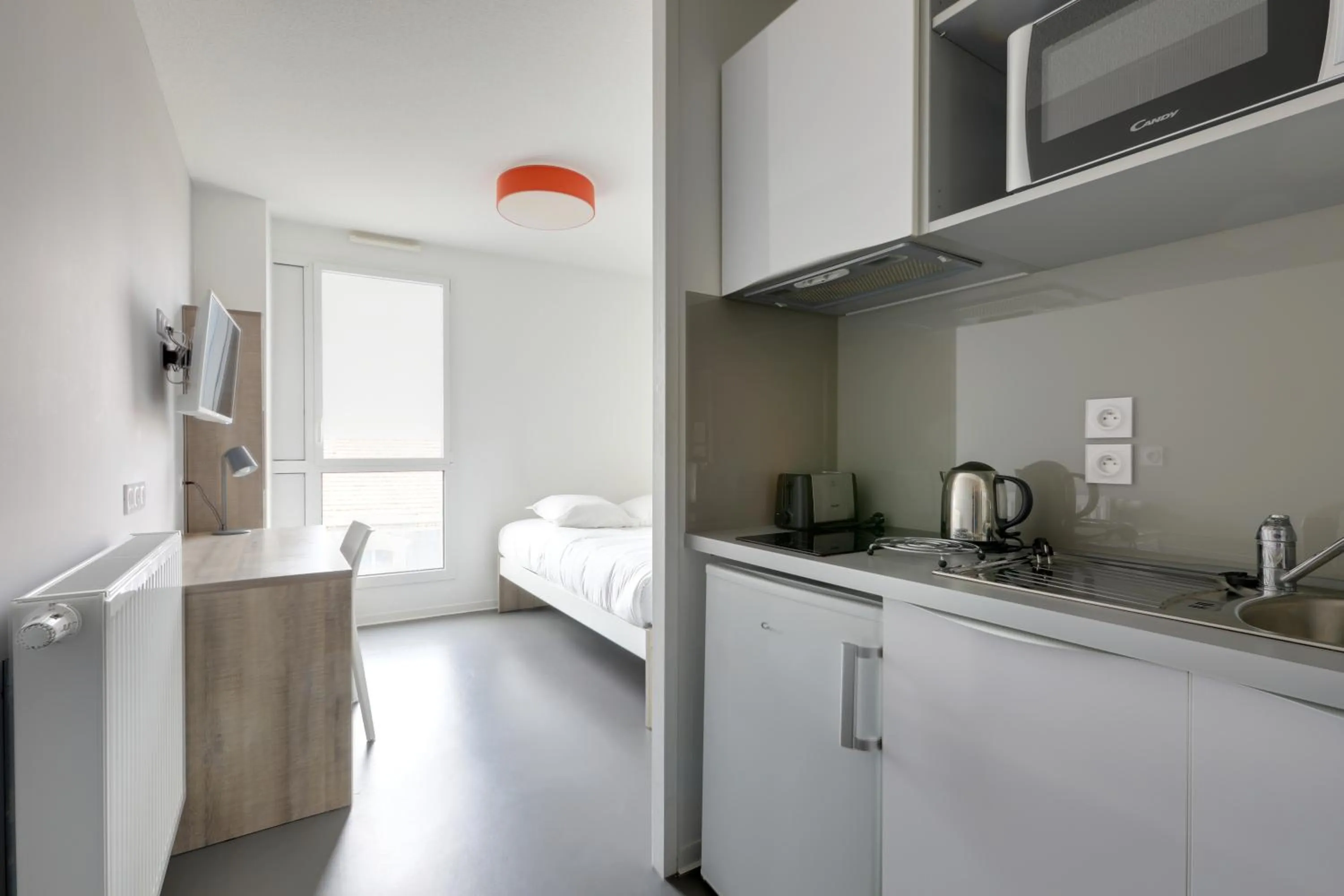 Kitchen or kitchenette in All Suites Appart Hôtel - Bordeaux Centre Gare