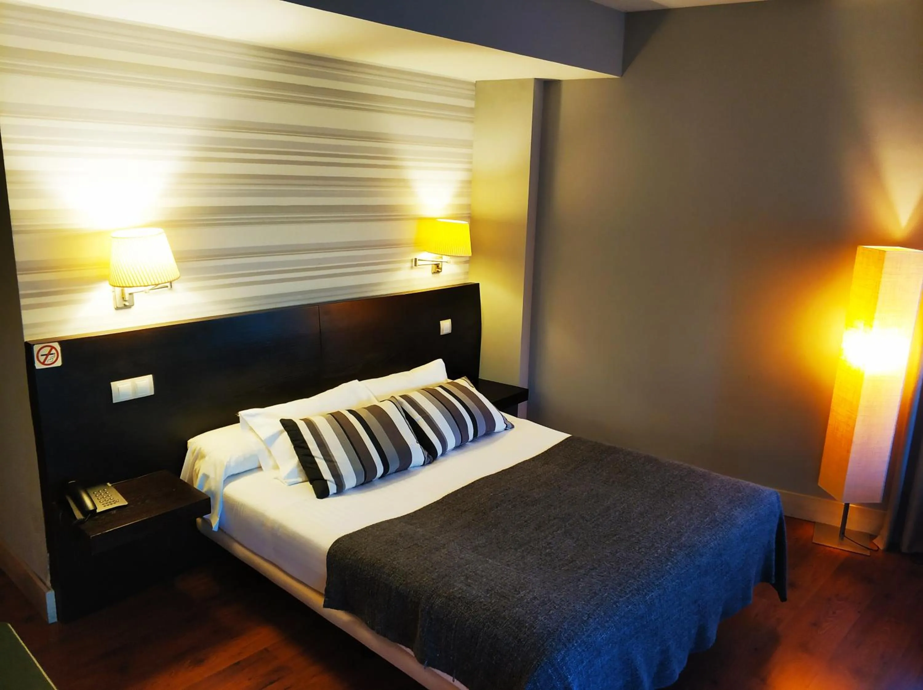 Bed in Hotel Puerta del Arco