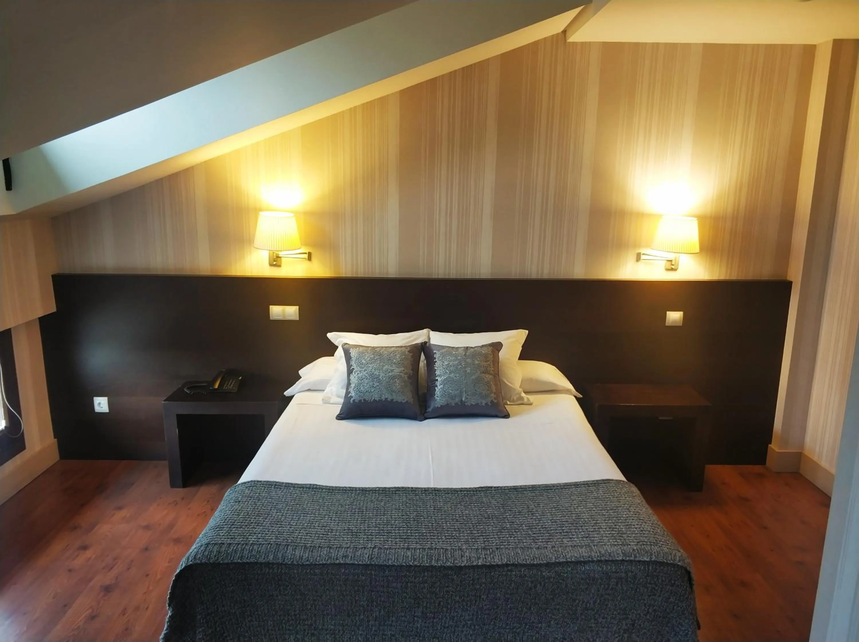 Bed in Hotel Puerta del Arco