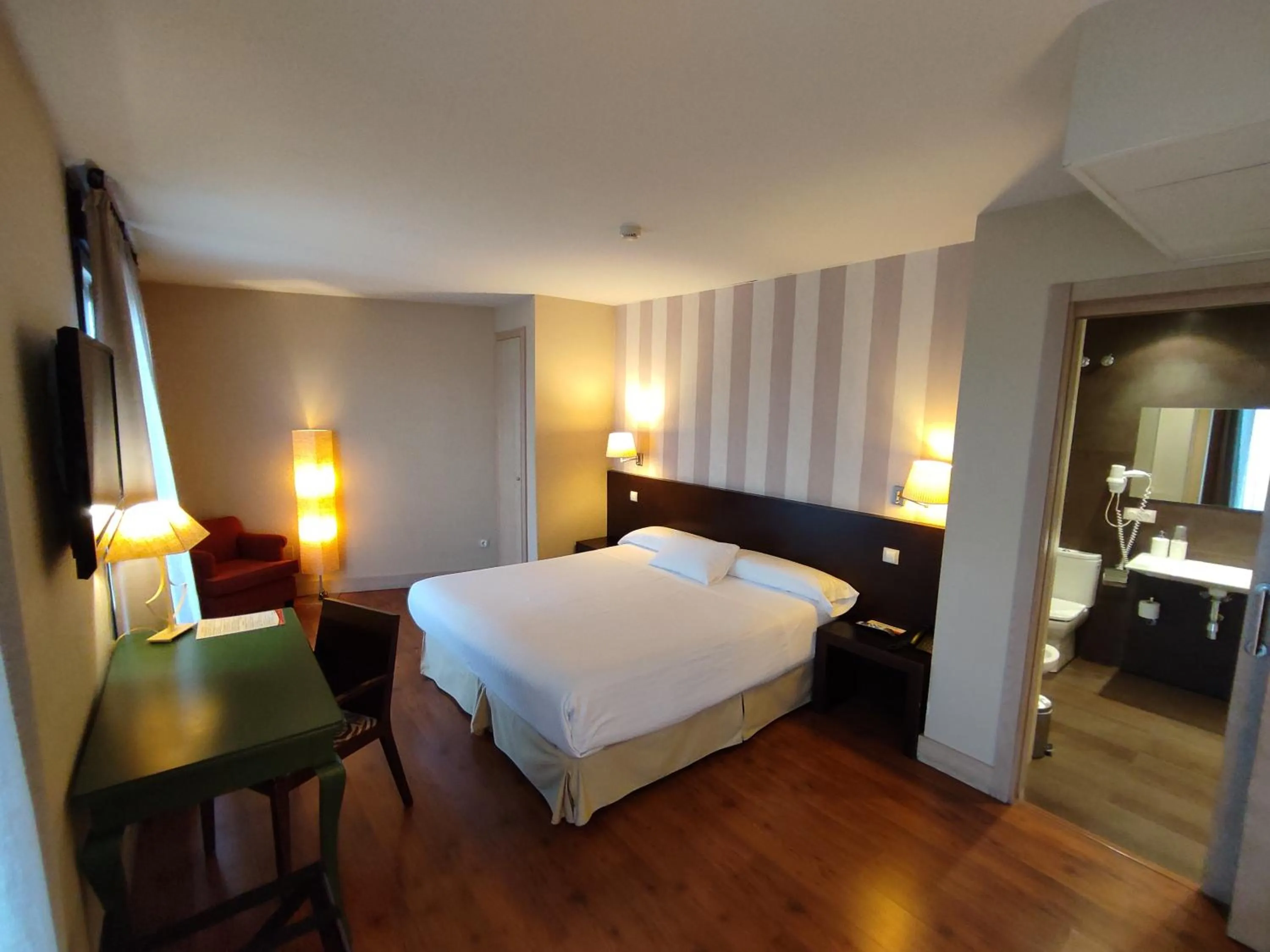 Bed in Hotel Puerta del Arco