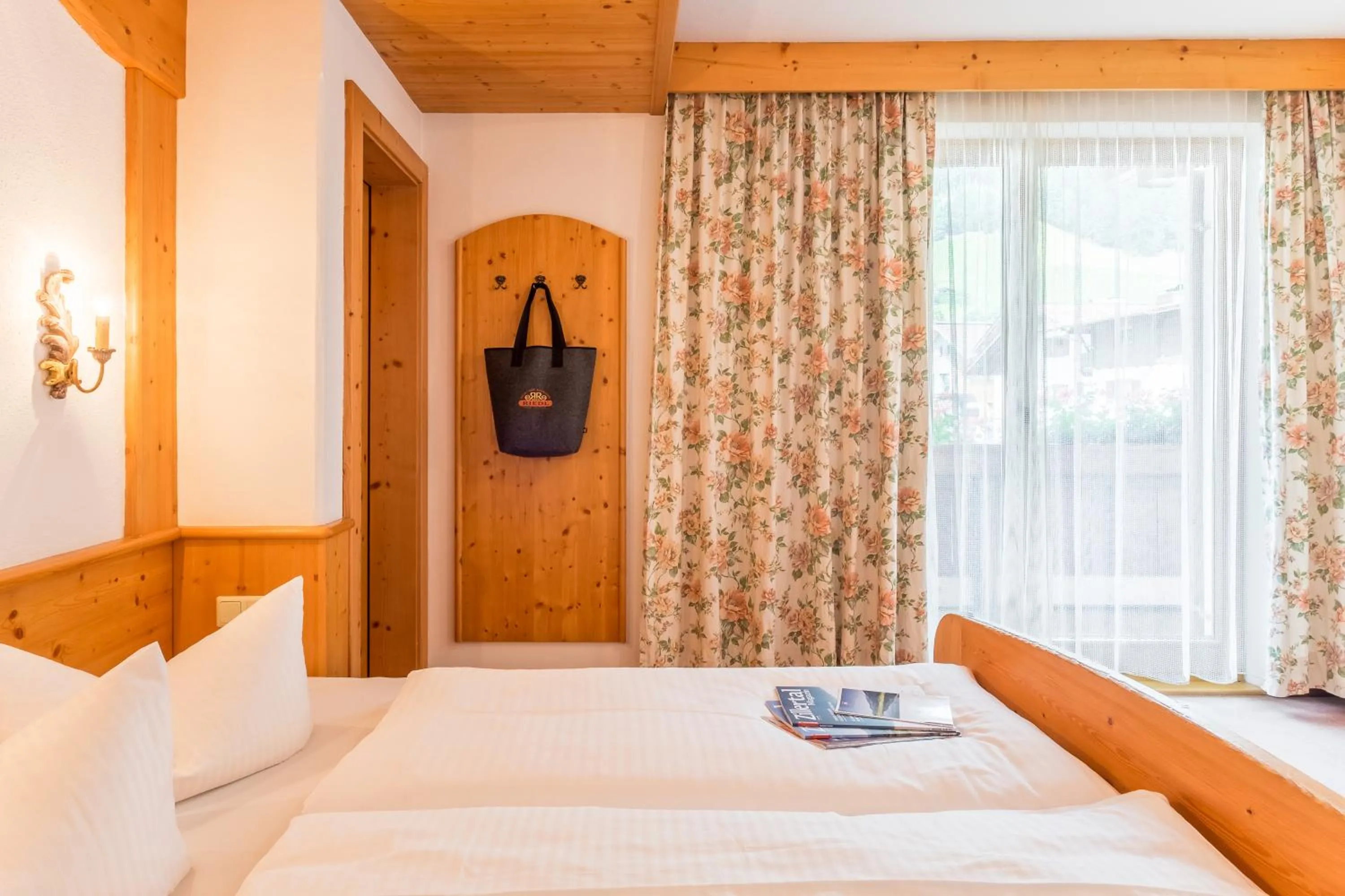 Photo of the whole room, Bed in Hotel Riedl im Zillertal