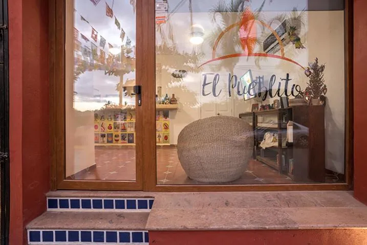 Property logo or sign in Casa Lotería -Pueblito Sayulita- Colorful, Family and Relax Experience with Private Parking and Pool