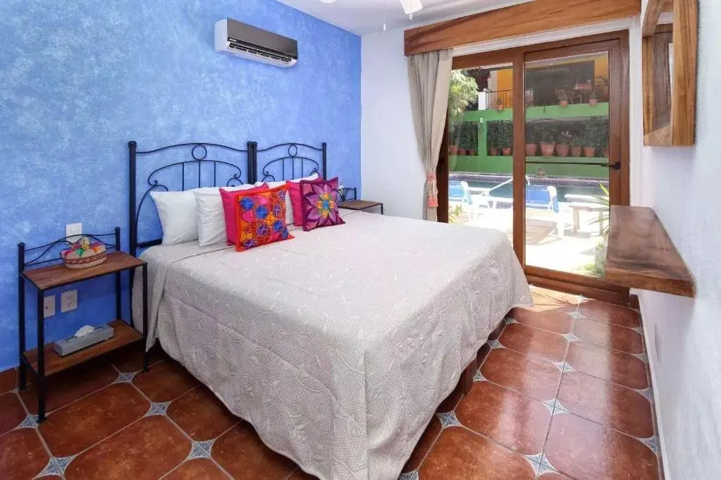 Bedroom, Bed in Casa Lotería -Pueblito Sayulita- Colorful, Family and Relax Experience with Private Parking and Pool