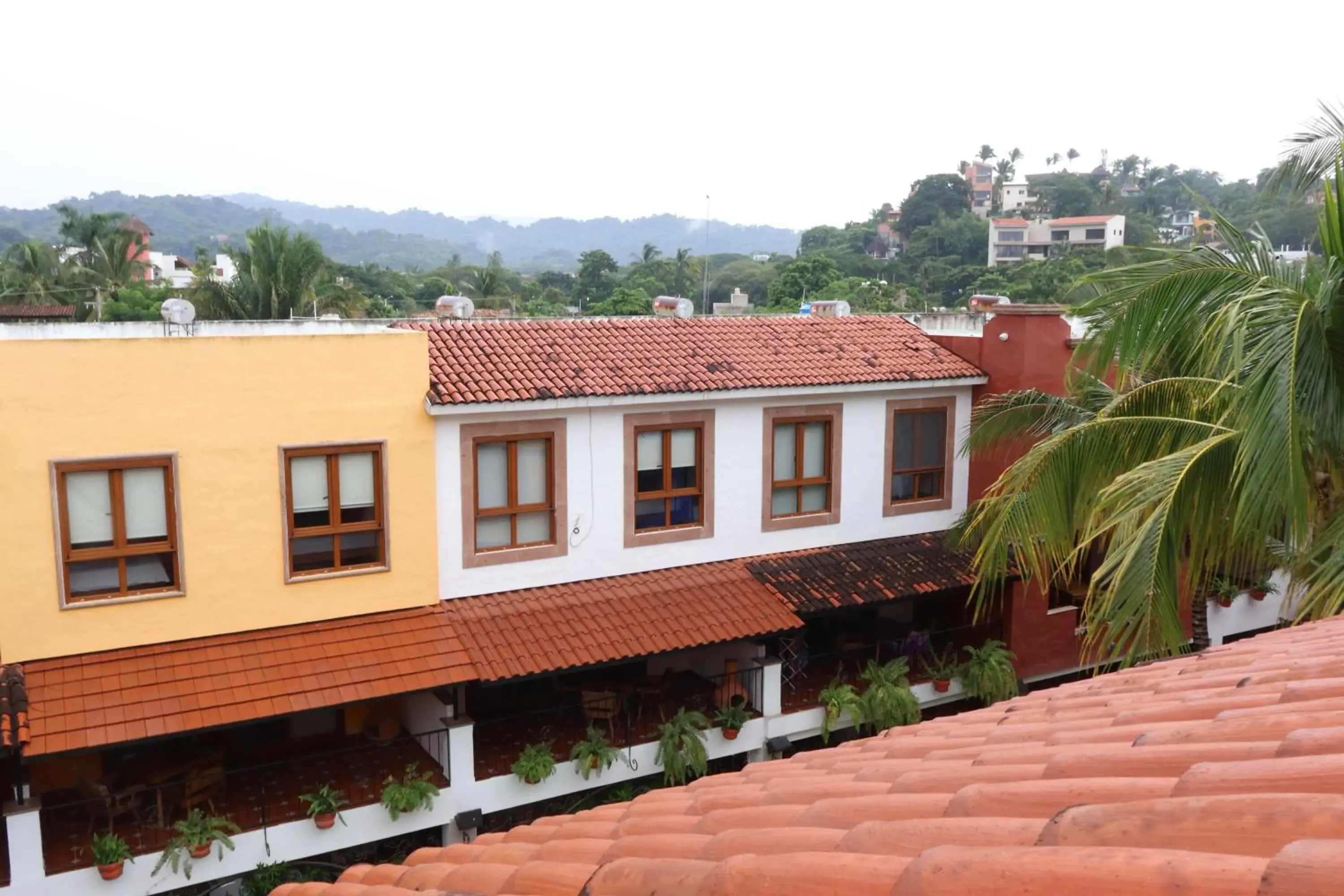 Property building in Casa Lotería -Pueblito Sayulita- Colorful, Family and Relax Experience with Private Parking and Pool Property building in Casa Lotería -Pueblito Sayulita- Colorful, Family and Relax Experience with Private Parking and Pool