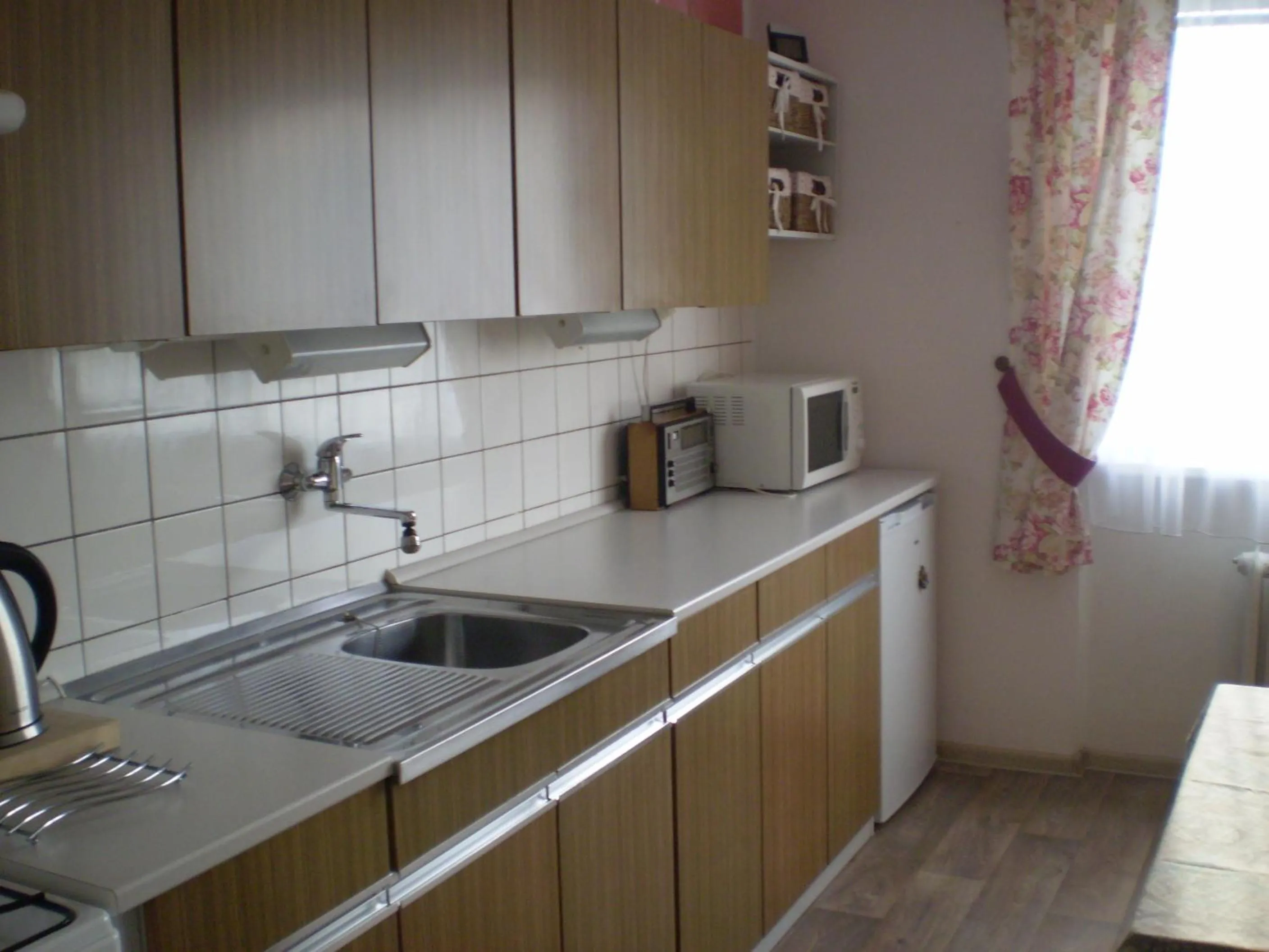 Kitchen or kitchenette in apartman pro 4 osoby