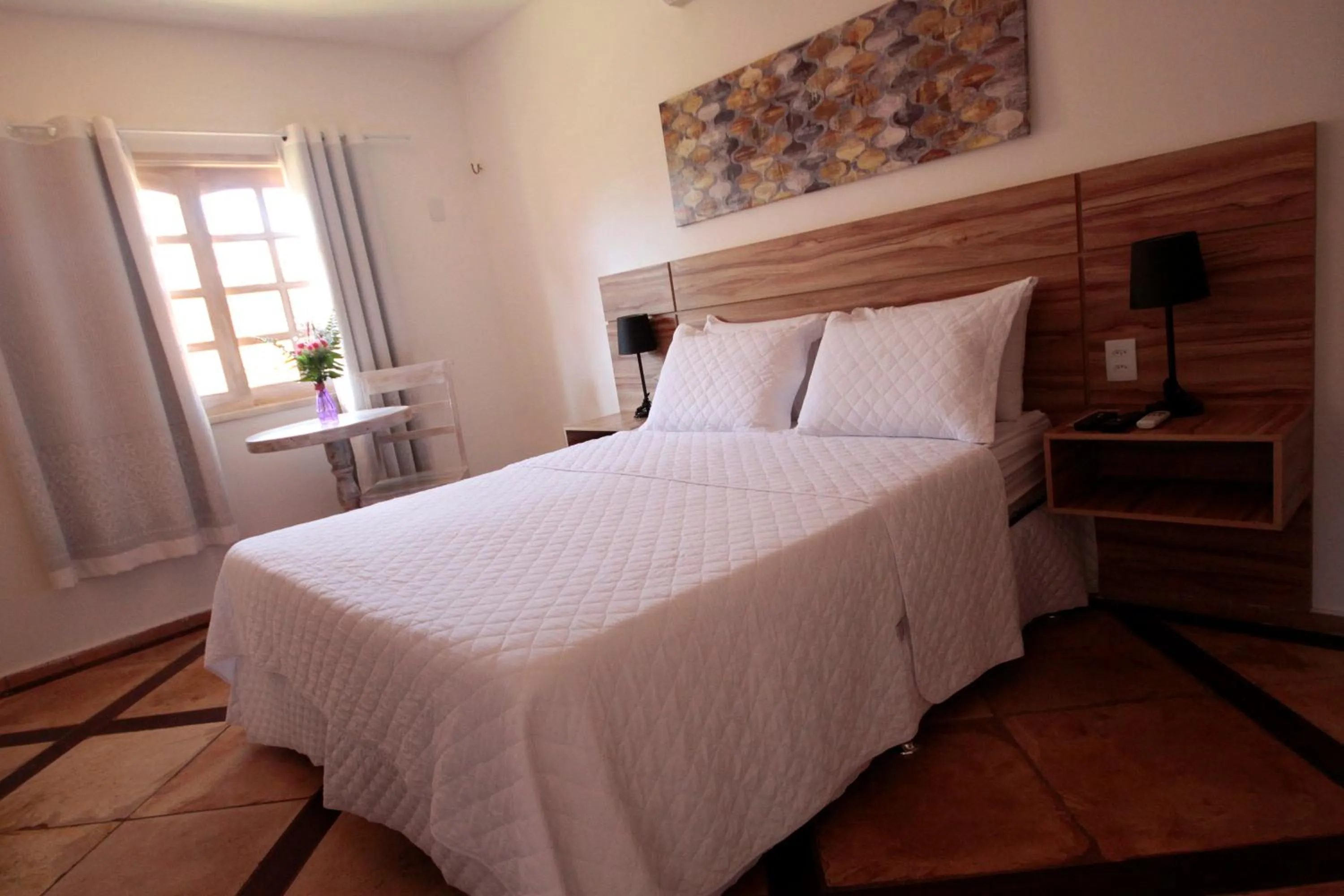 Bed in Pousada Tranquilandia Village